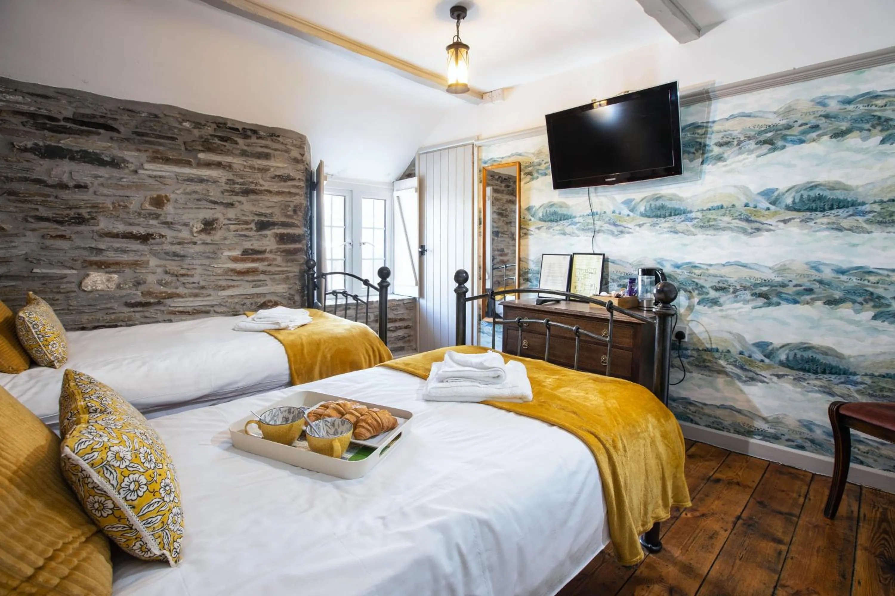 Bed in The Olde Malthouse Inn