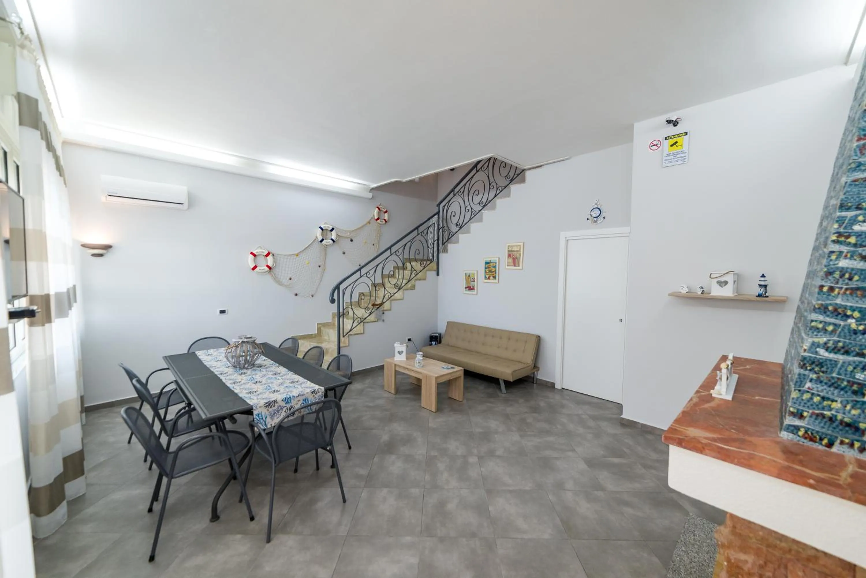 Communal lounge/ TV room in Castello di Sabbia