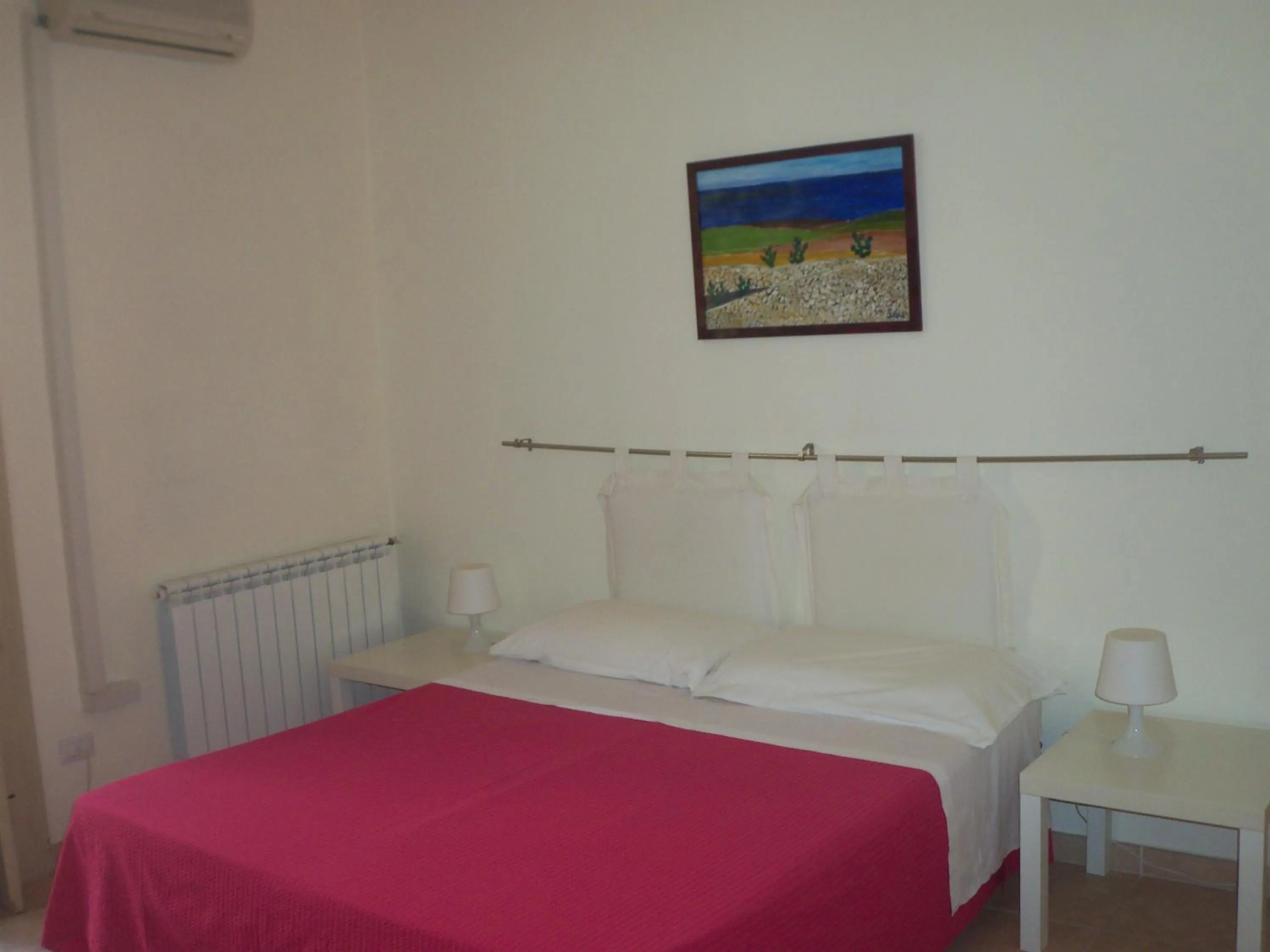 Photo of the whole room, Bed in B&B CARAVAGGIO basic rooms near Ortigia