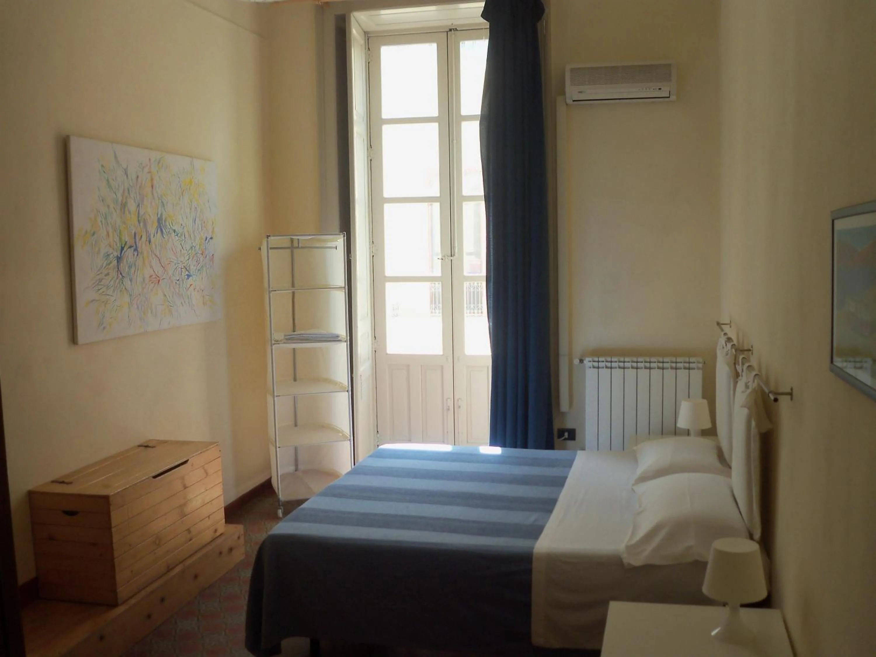 Photo of the whole room, Bed in B&B CARAVAGGIO basic rooms near Ortigia