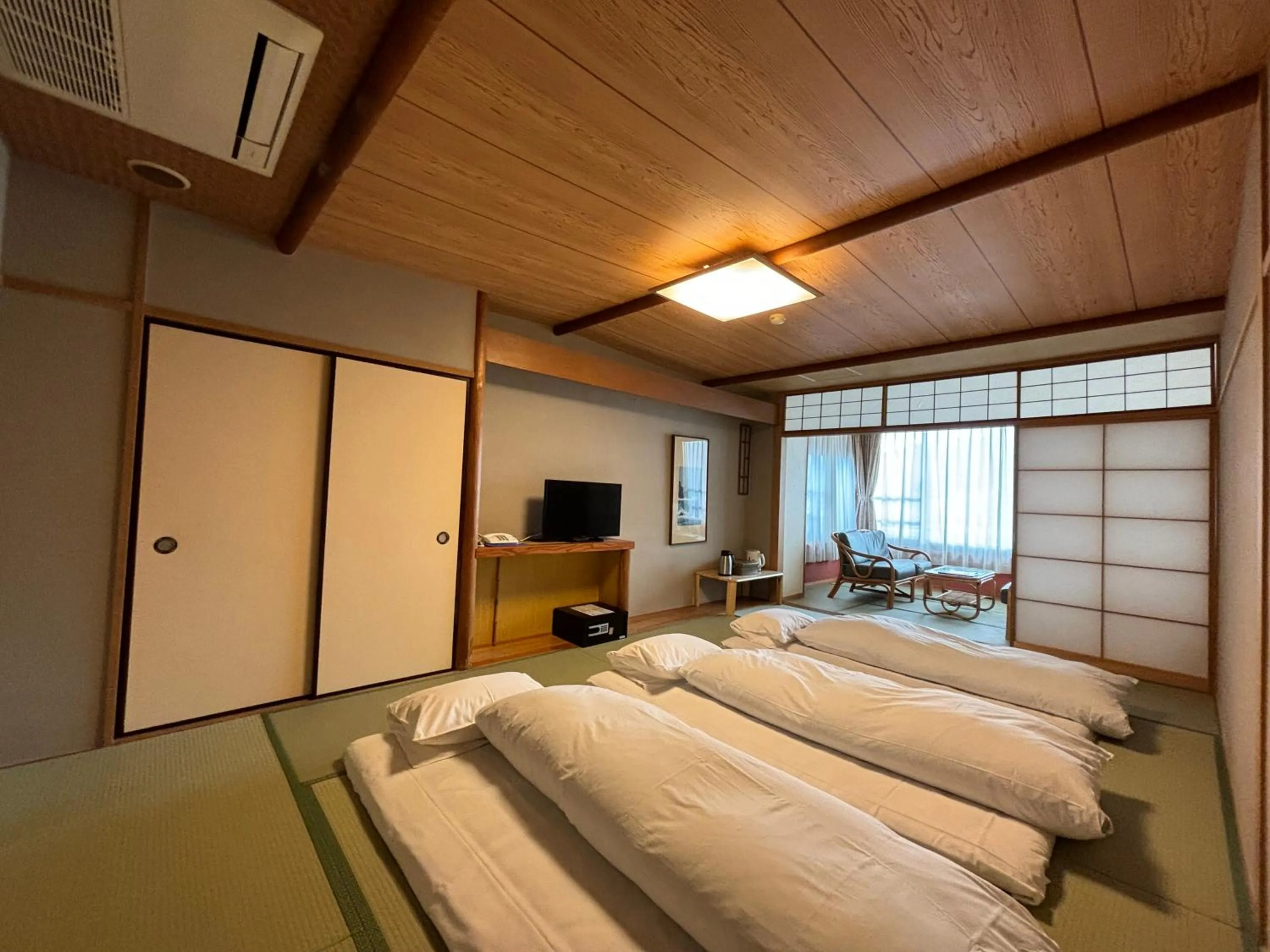 Photo of the whole room, Bed in Kameya Rakan