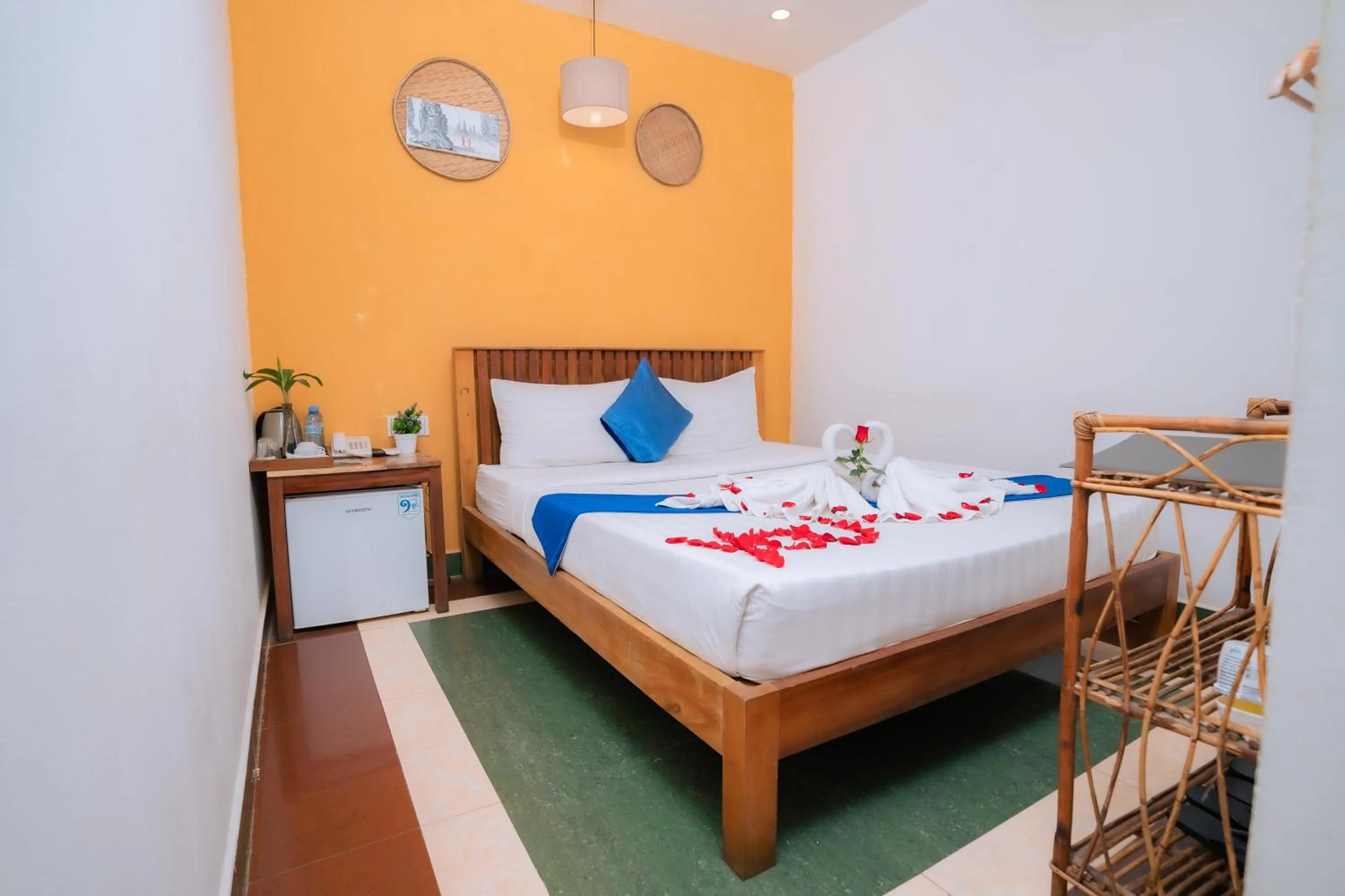 Bed in Grand Elevation Hotel