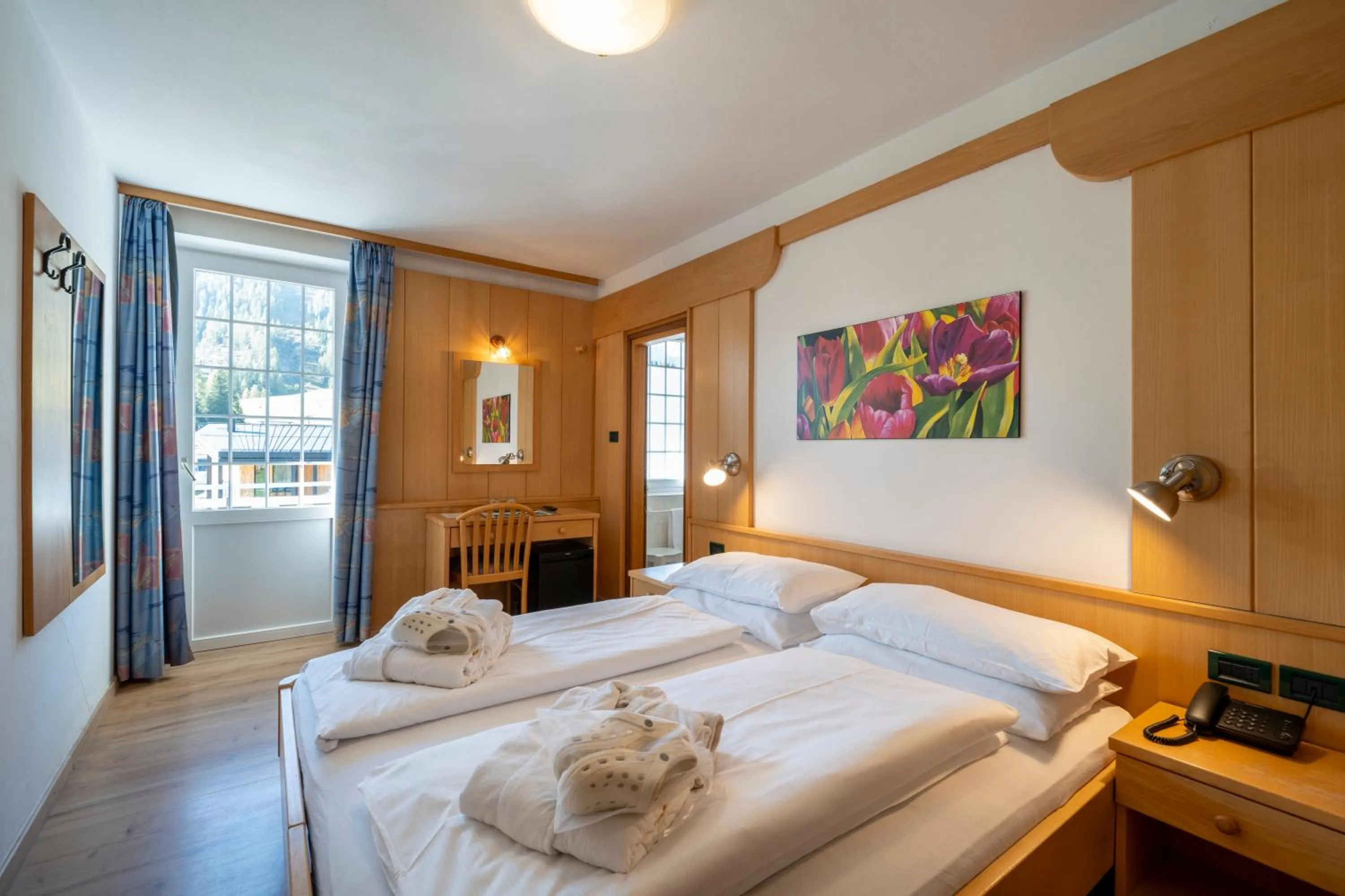 Bed in MyTime Hotels Savoy