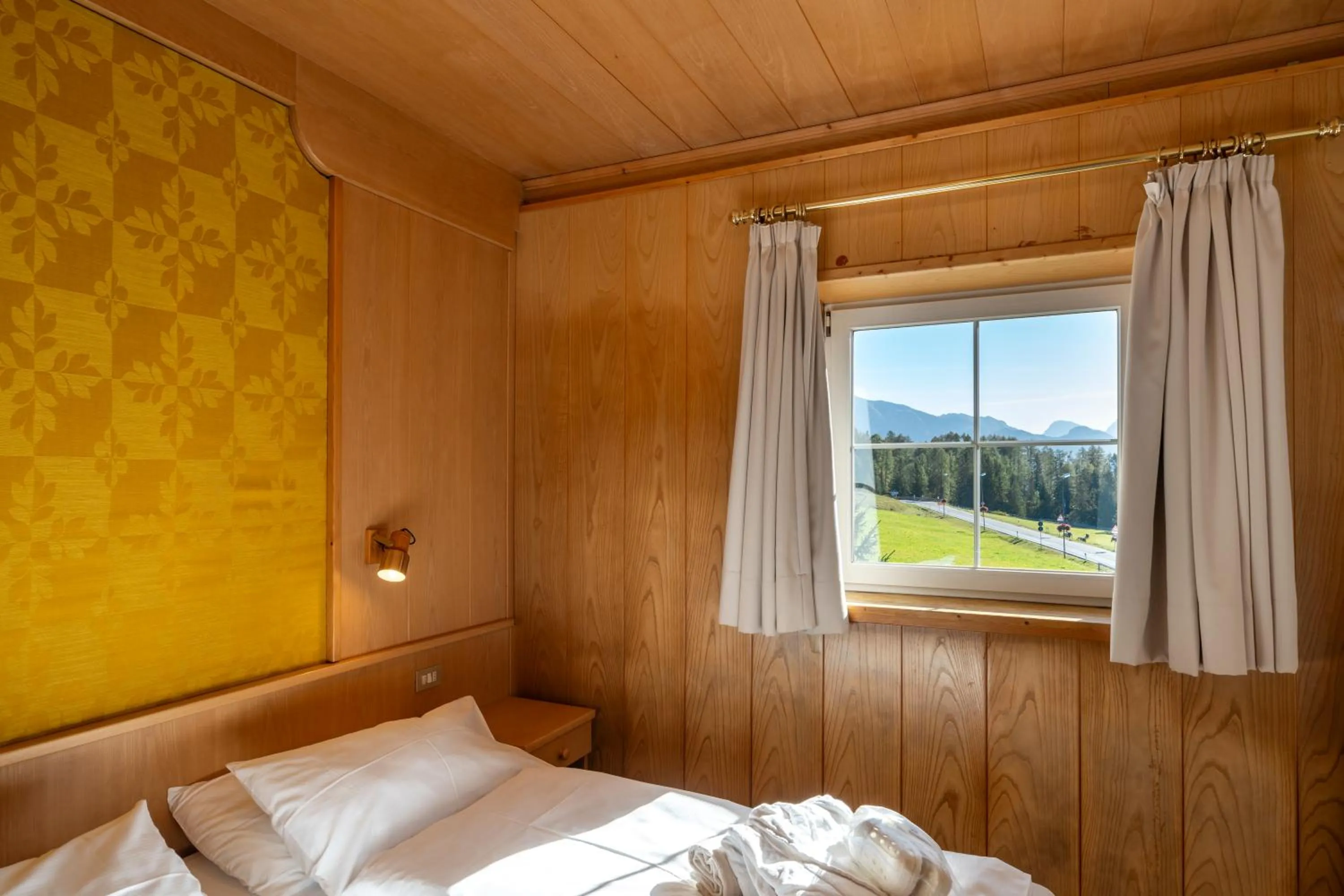 Bed in MyTime Hotels Savoy