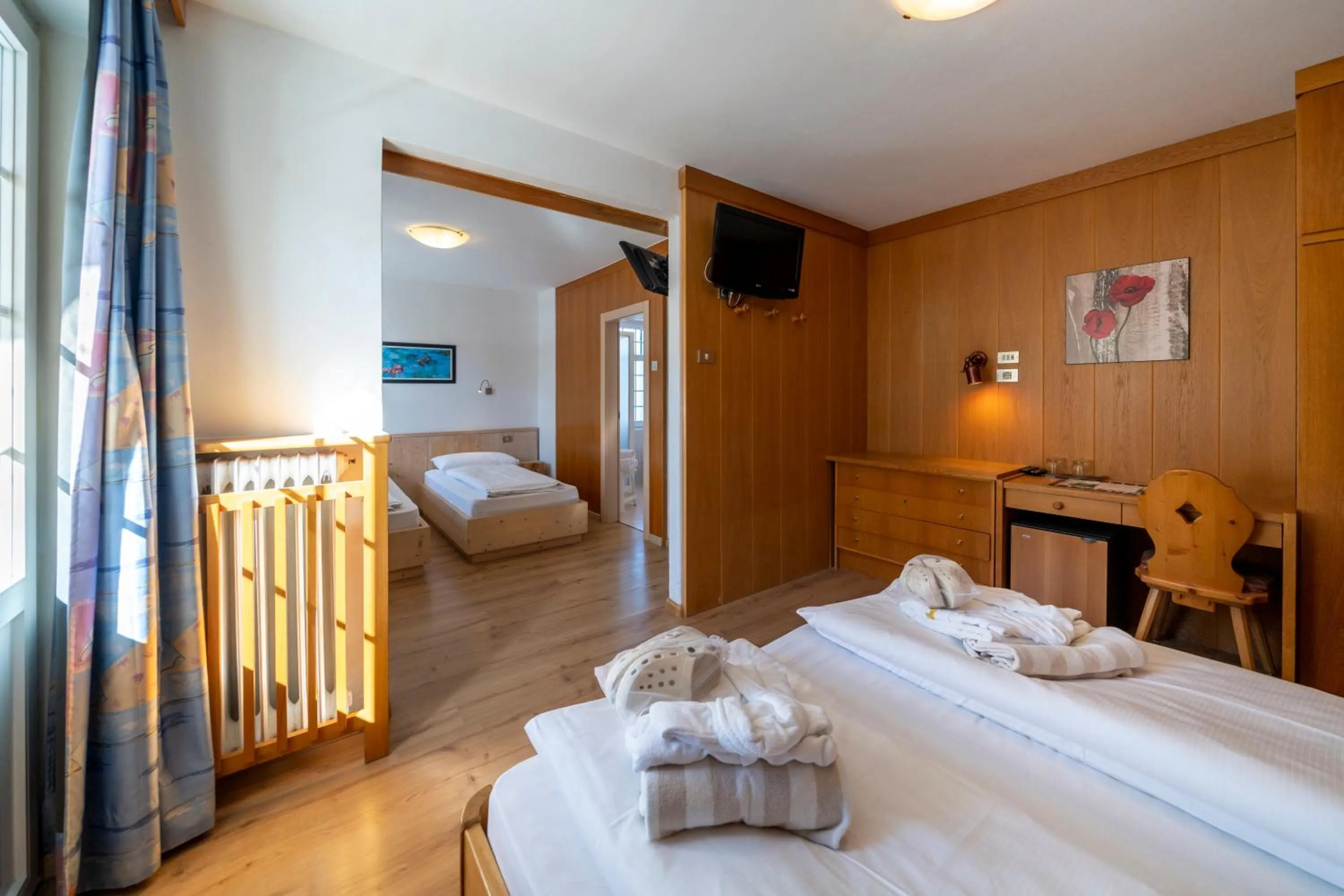 Bed in MyTime Hotels Savoy