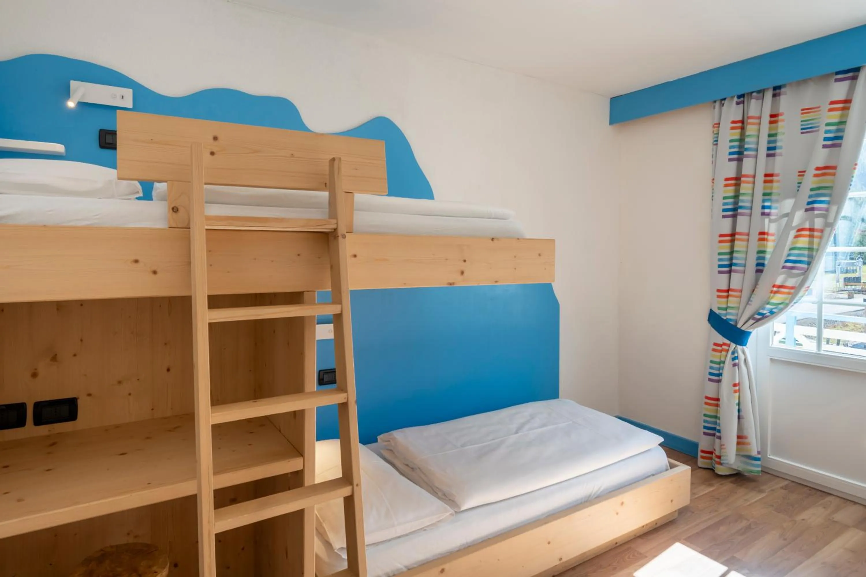 Bed in MyTime Hotels Savoy