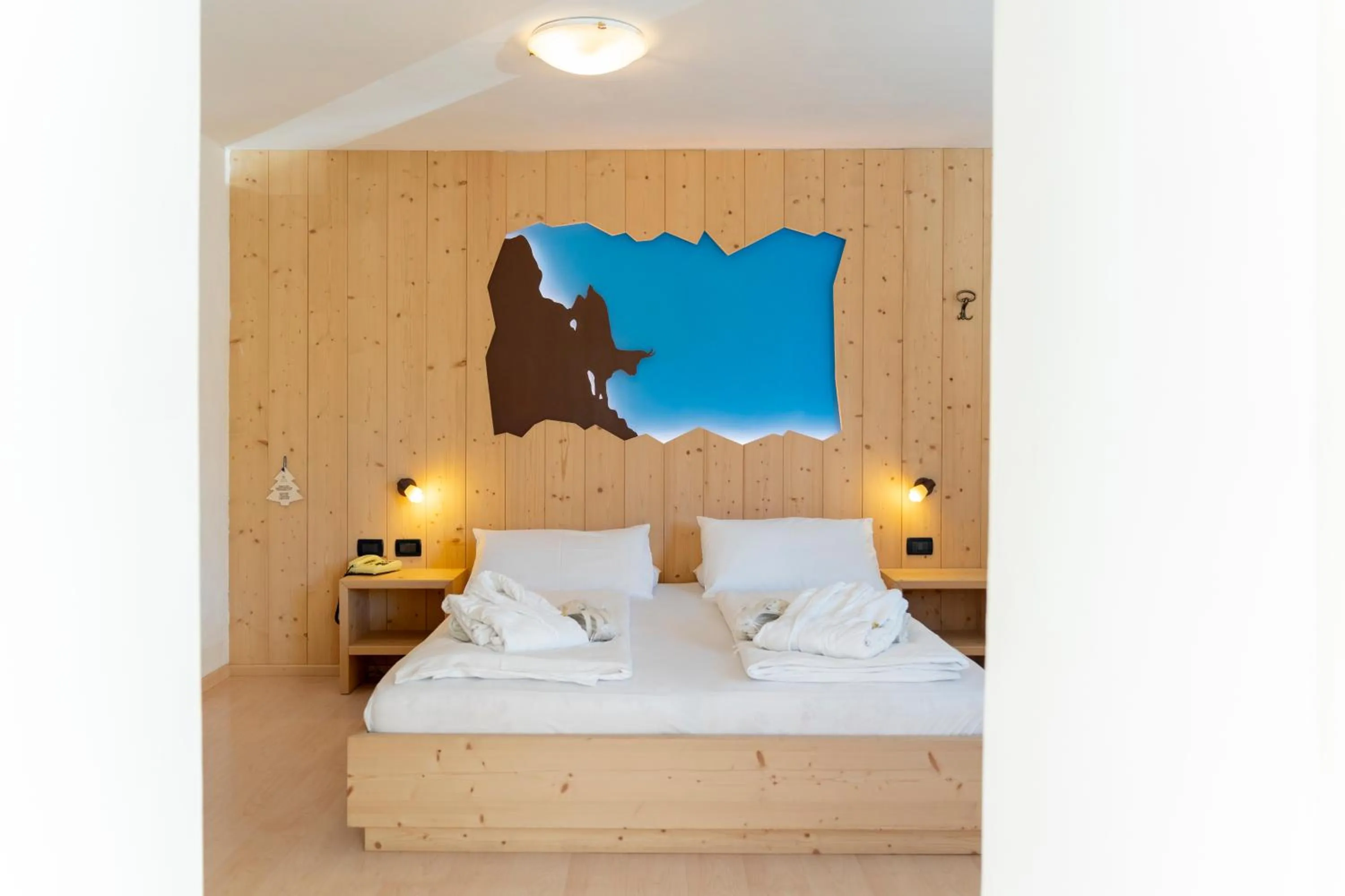 Bed in MyTime Hotels Savoy