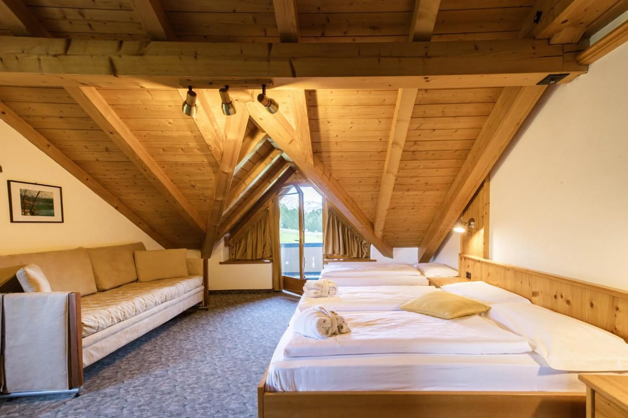 Bed in MyTime Hotels Savoy