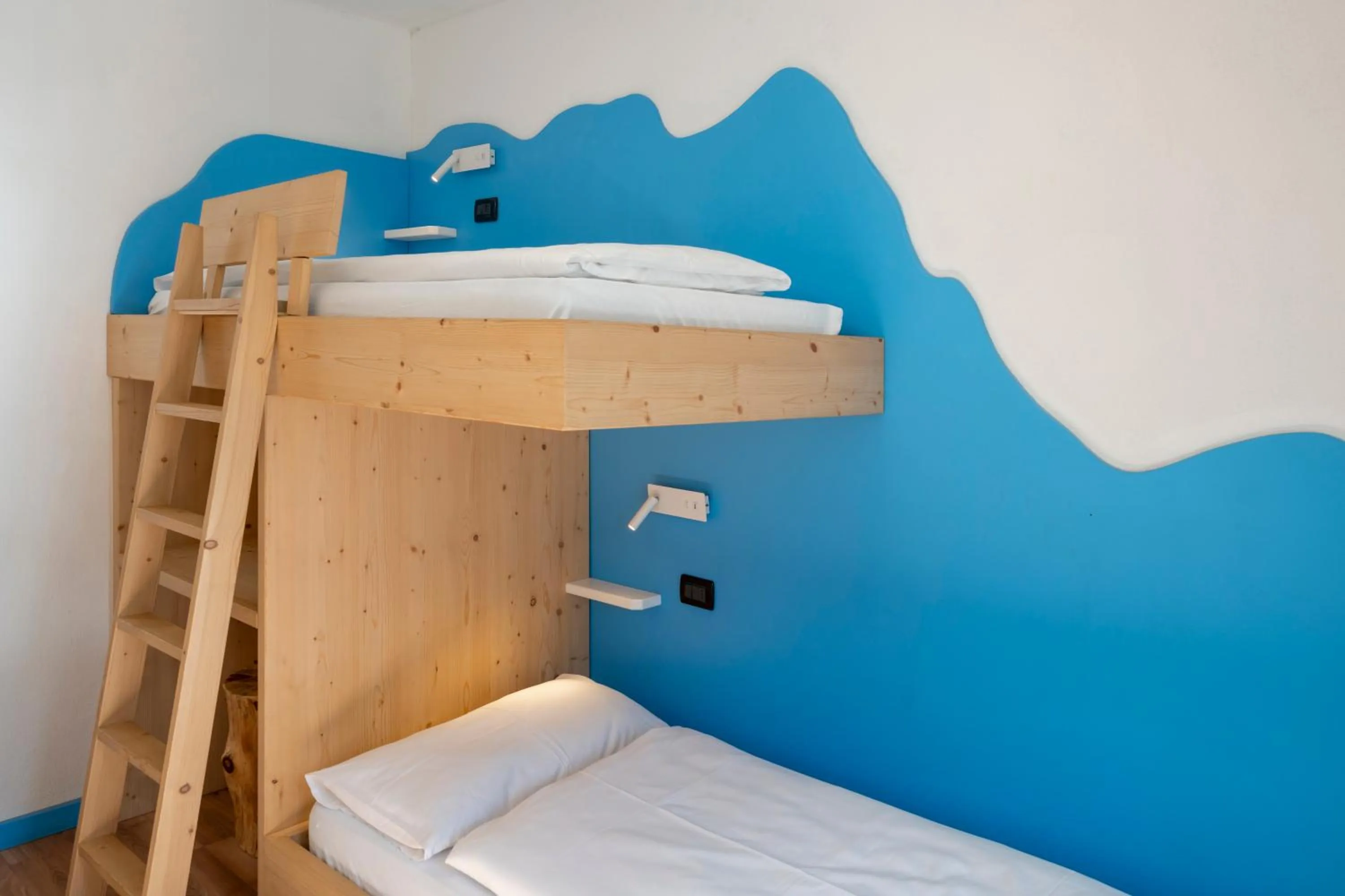 Bed in MyTime Hotels Savoy