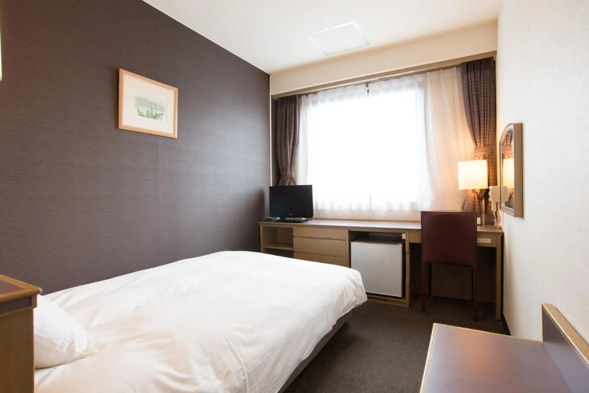 Bed in Hotel Suncrest