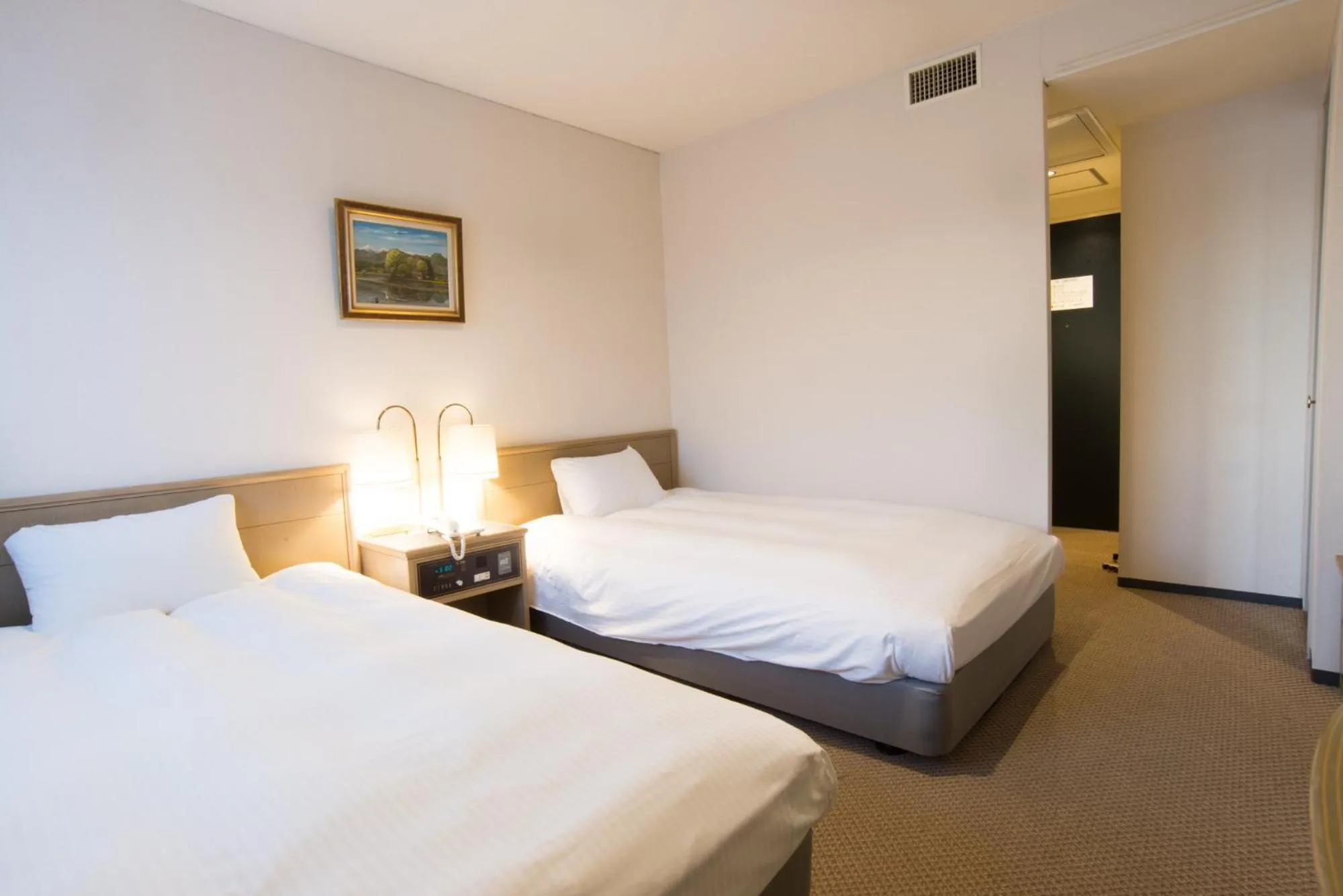 Bed in Hotel Suncrest