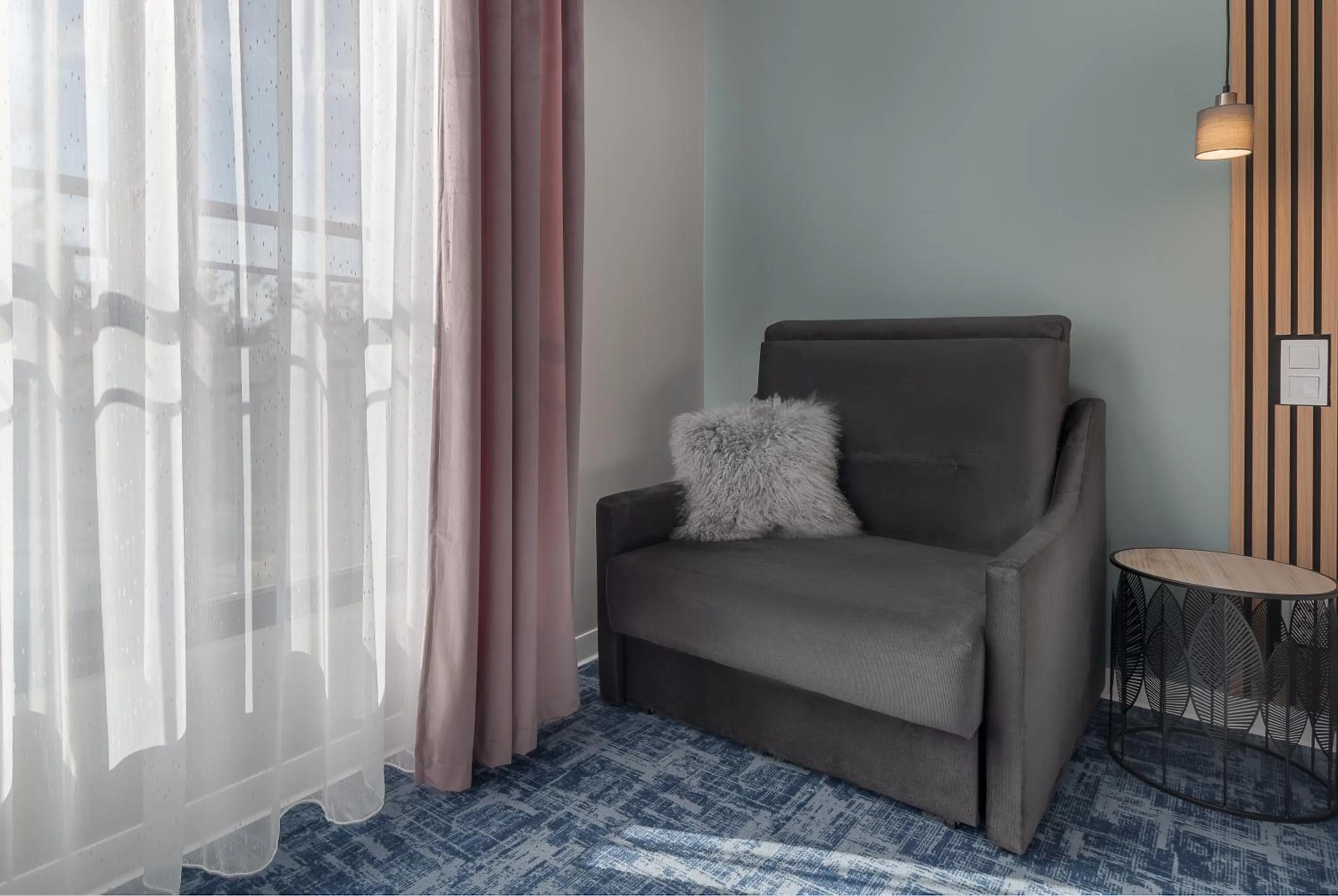 Seating area in Aparthotel Aria Boutique