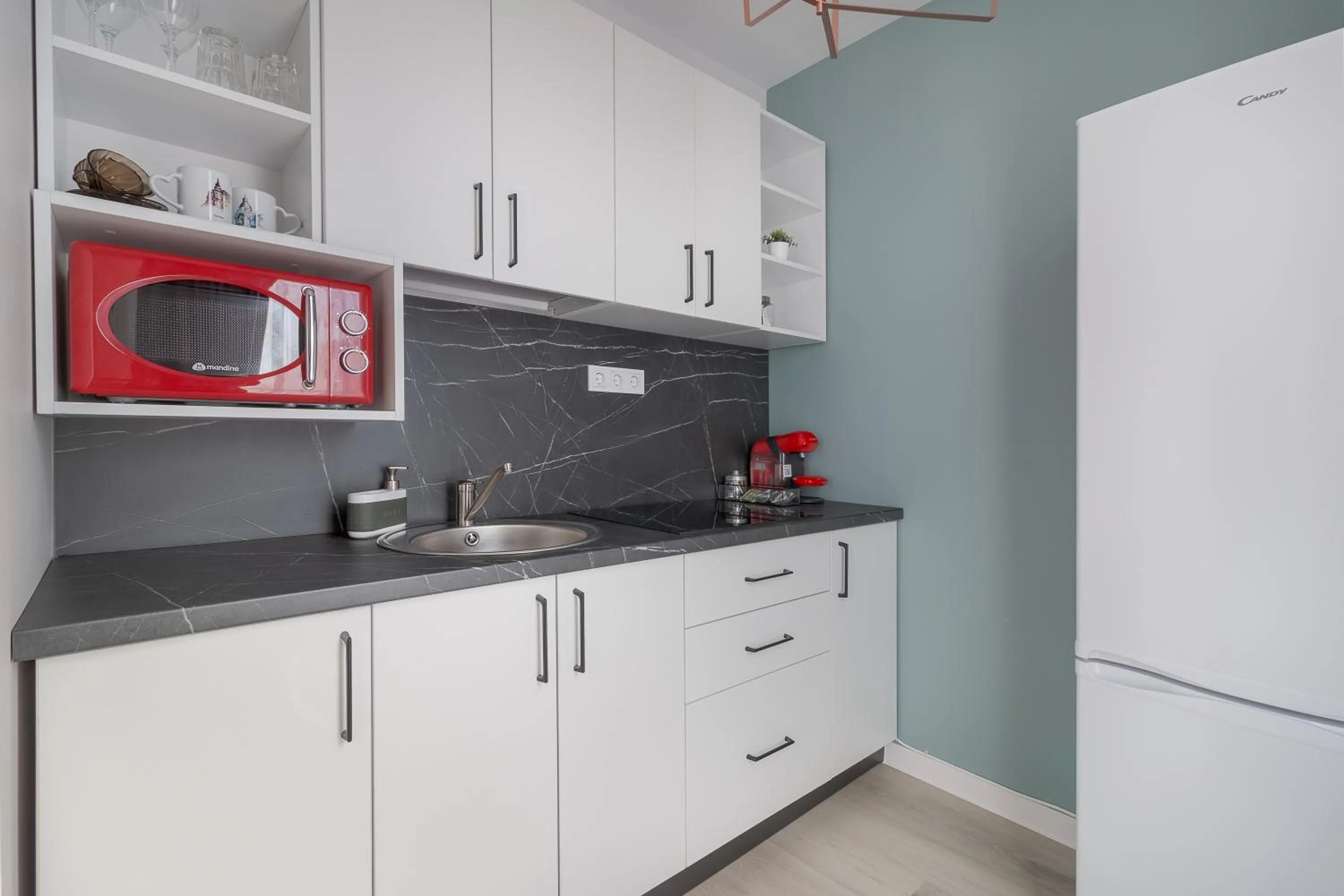 Kitchen or kitchenette in Aparthotel Aria Boutique