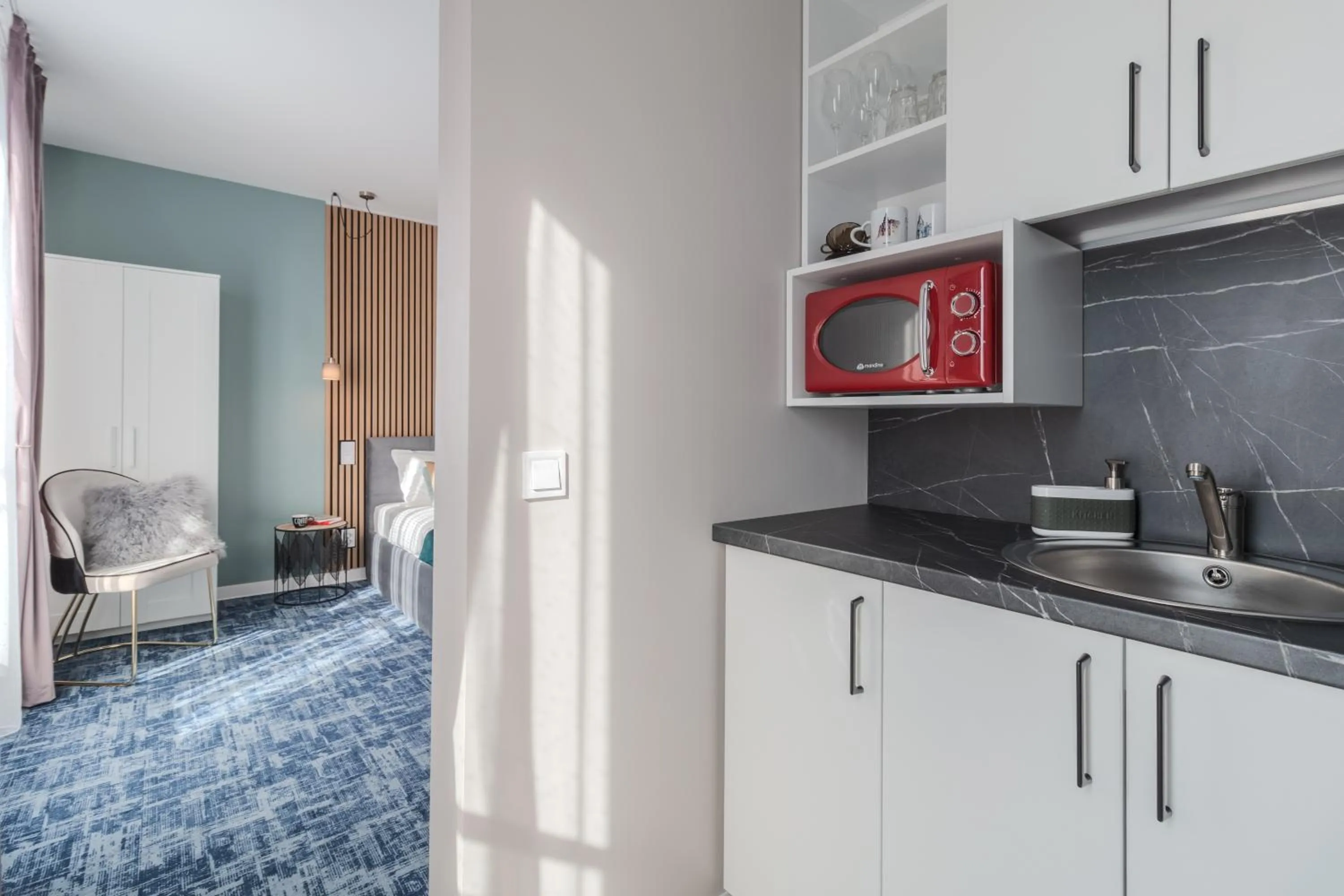 Kitchen or kitchenette in Aparthotel Aria Boutique