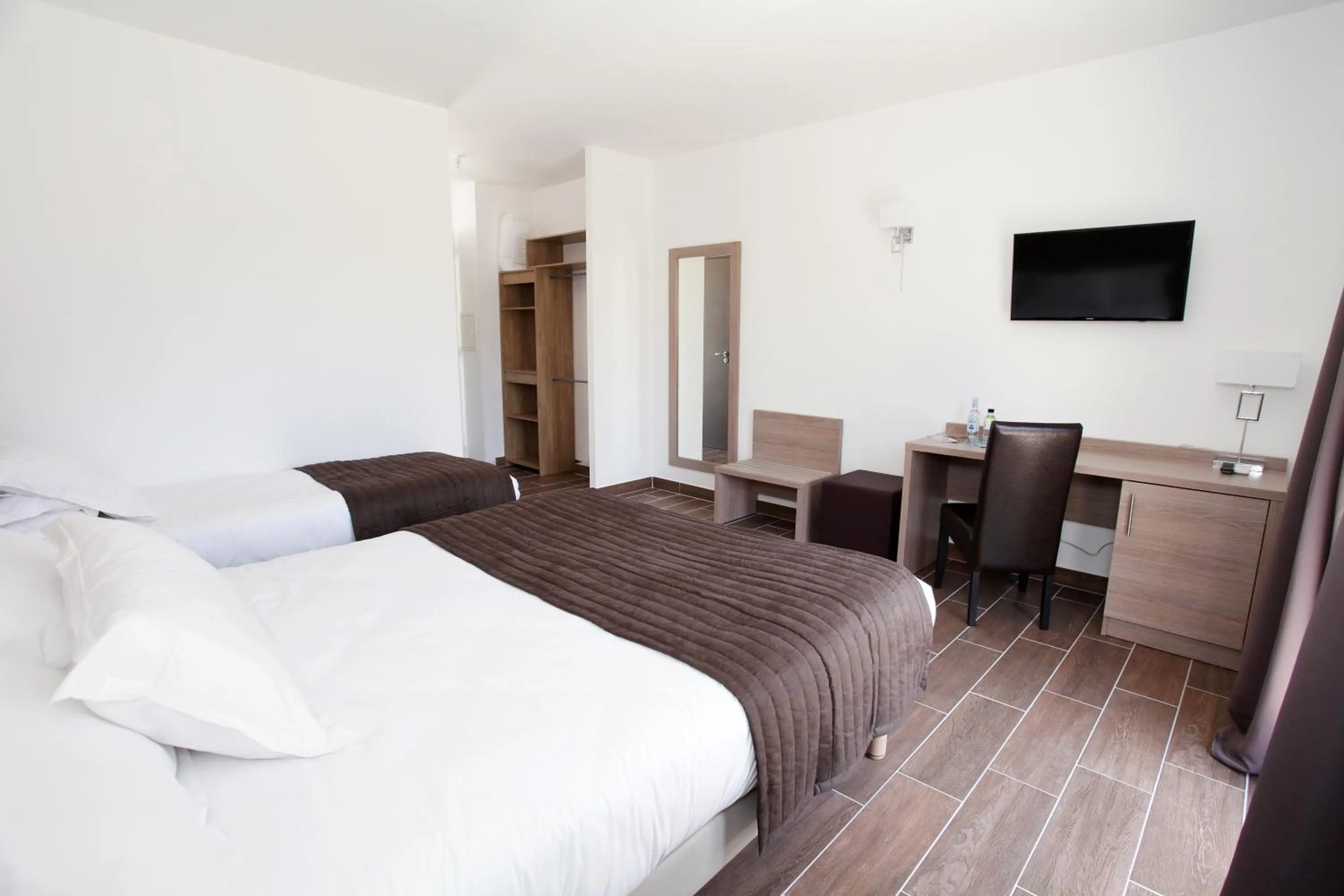 Photo of the whole room, Bed in Hôtel Des Nacres