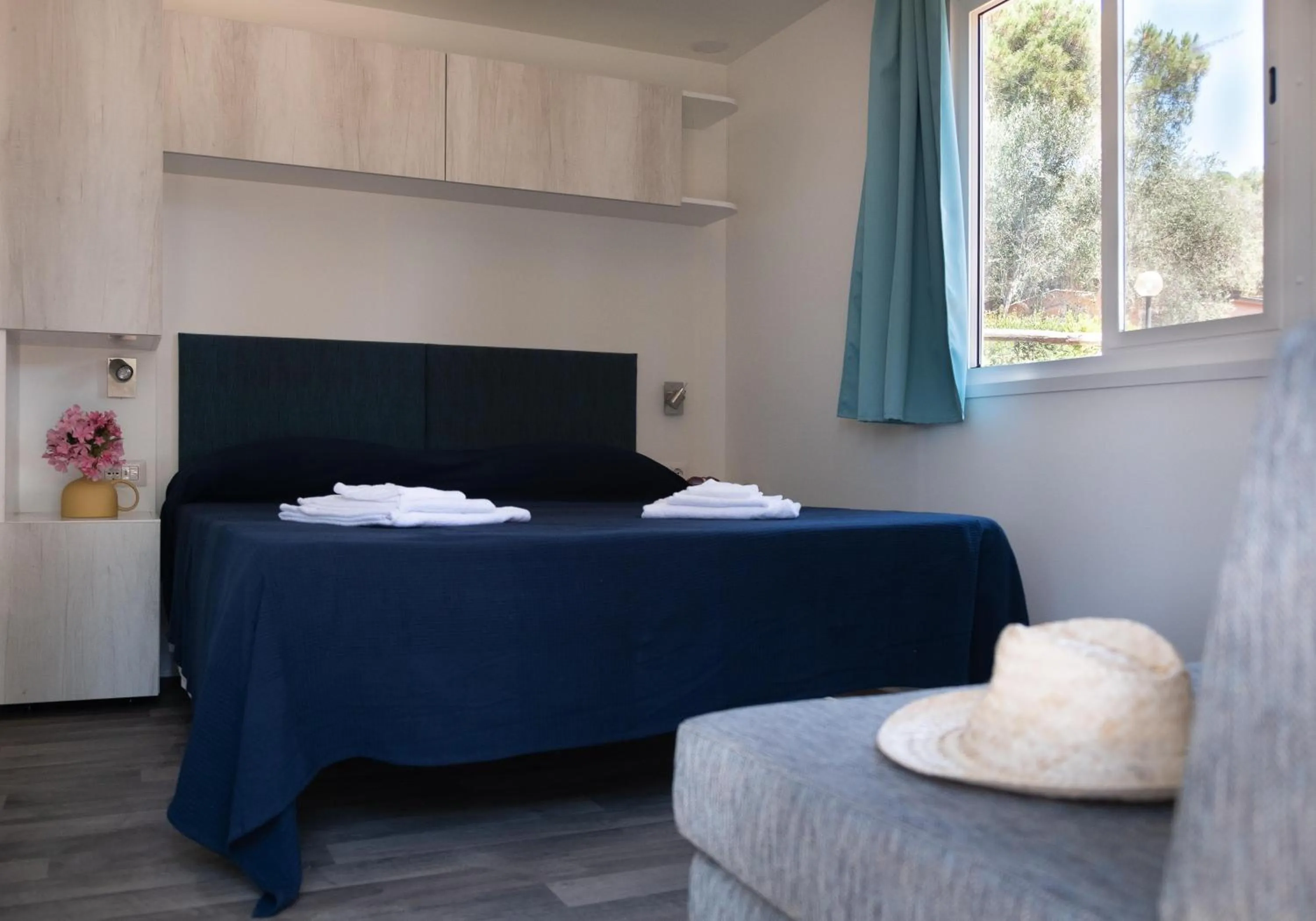 Photo of the whole room, Bed in Gitavillage Talamone