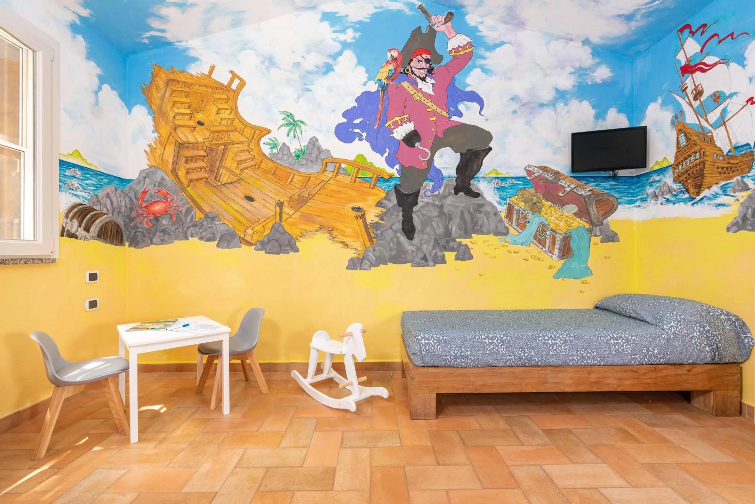 Photo of the whole room, Bed in Gitavillage Il Gabbiano