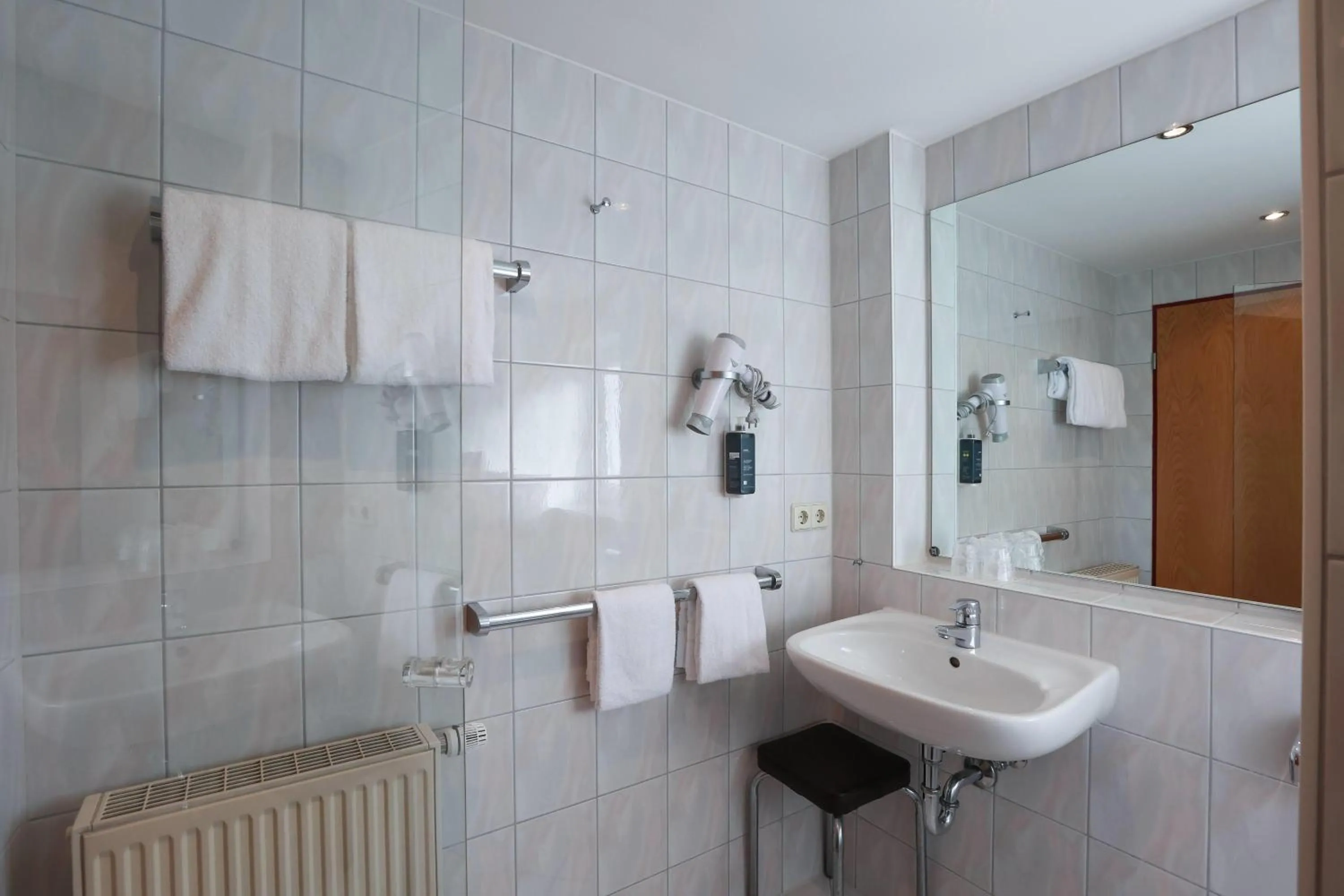 Bathroom in ANA Panorama, Trademark Collection by Wyndham