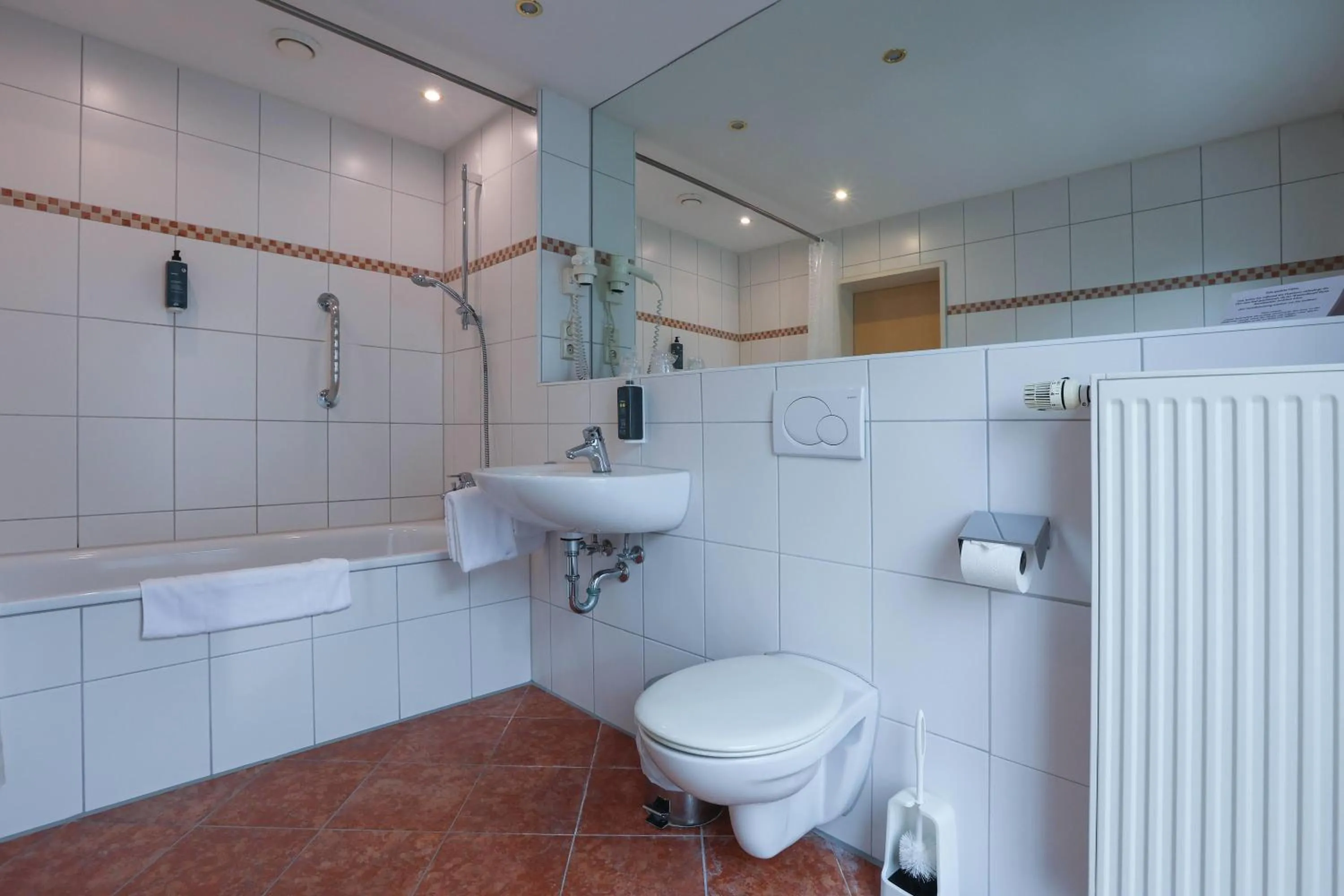 Bathroom in ANA Panorama, Trademark Collection by Wyndham