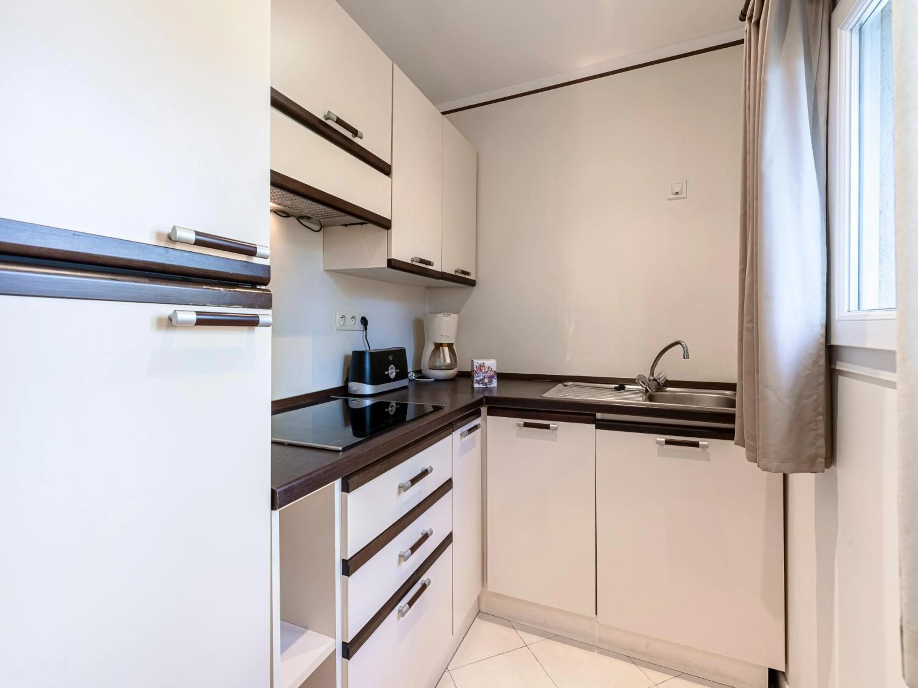 kitchen in Vacancéole - Résidence Lisa Maria