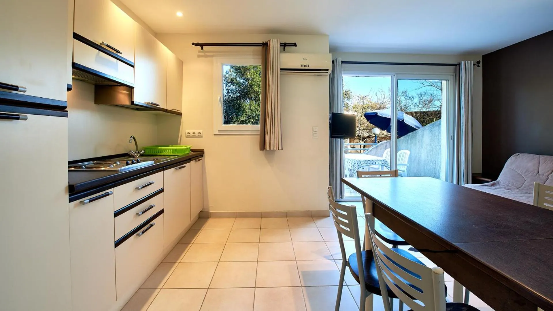 Kitchen or kitchenette in Vacancéole - Résidence Lisa Maria