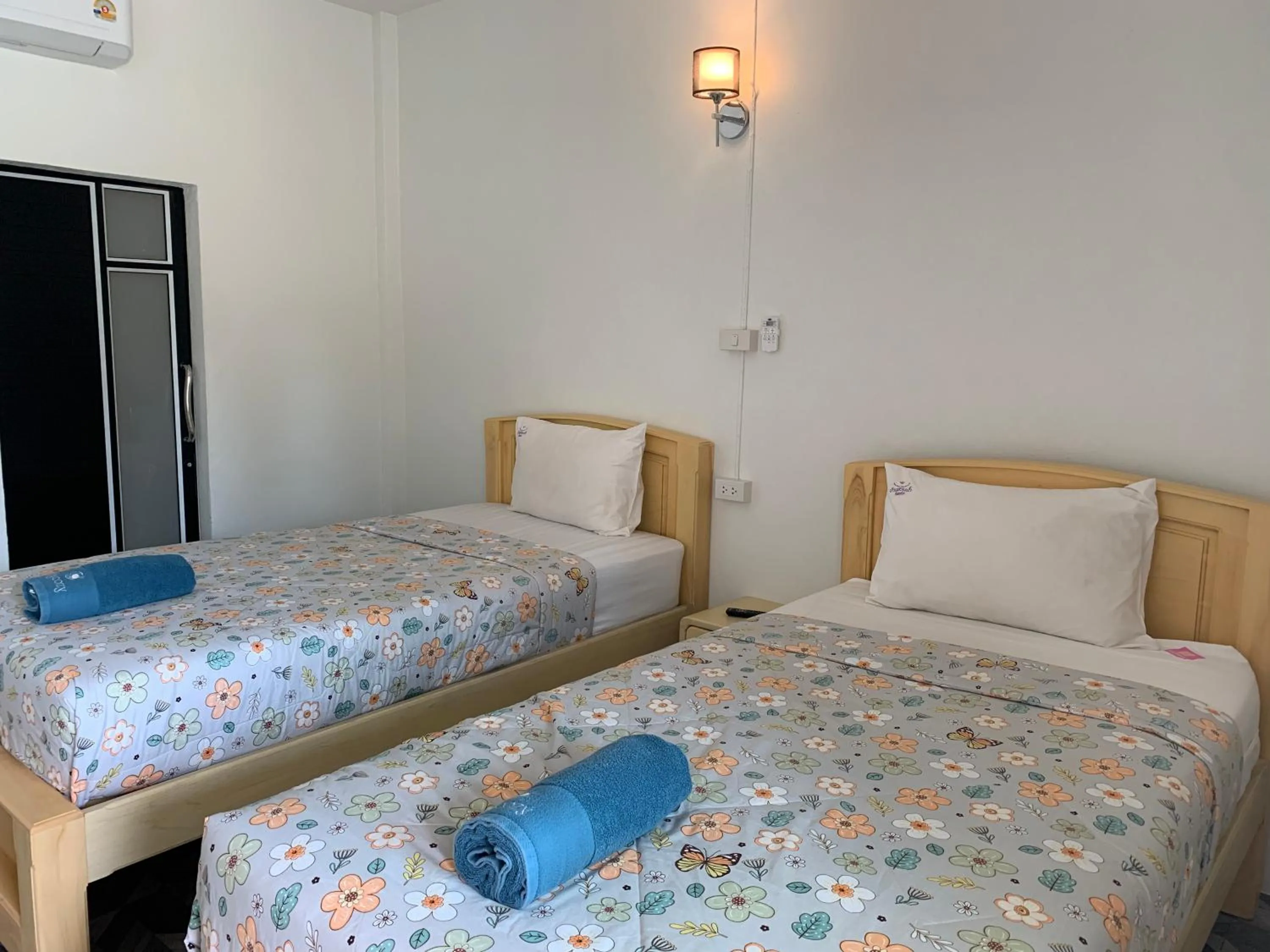 Bed in Baan Suan Nam Resort