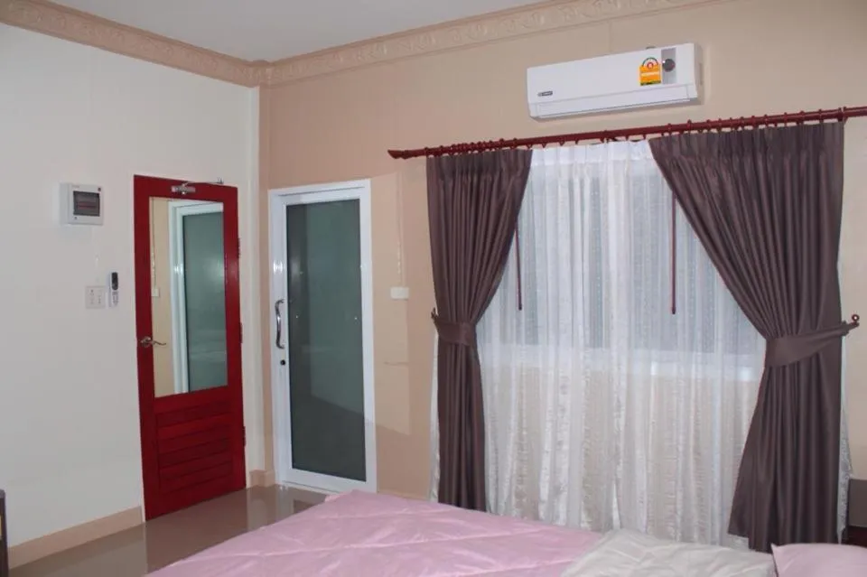 Bed in Baan Suan Nam Resort