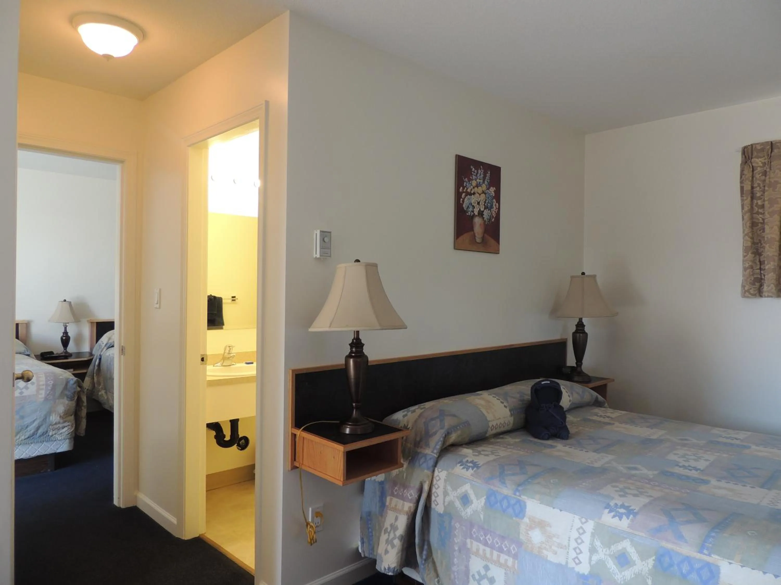 Photo of the whole room, Bed in 100 Mile Motel & RV Park