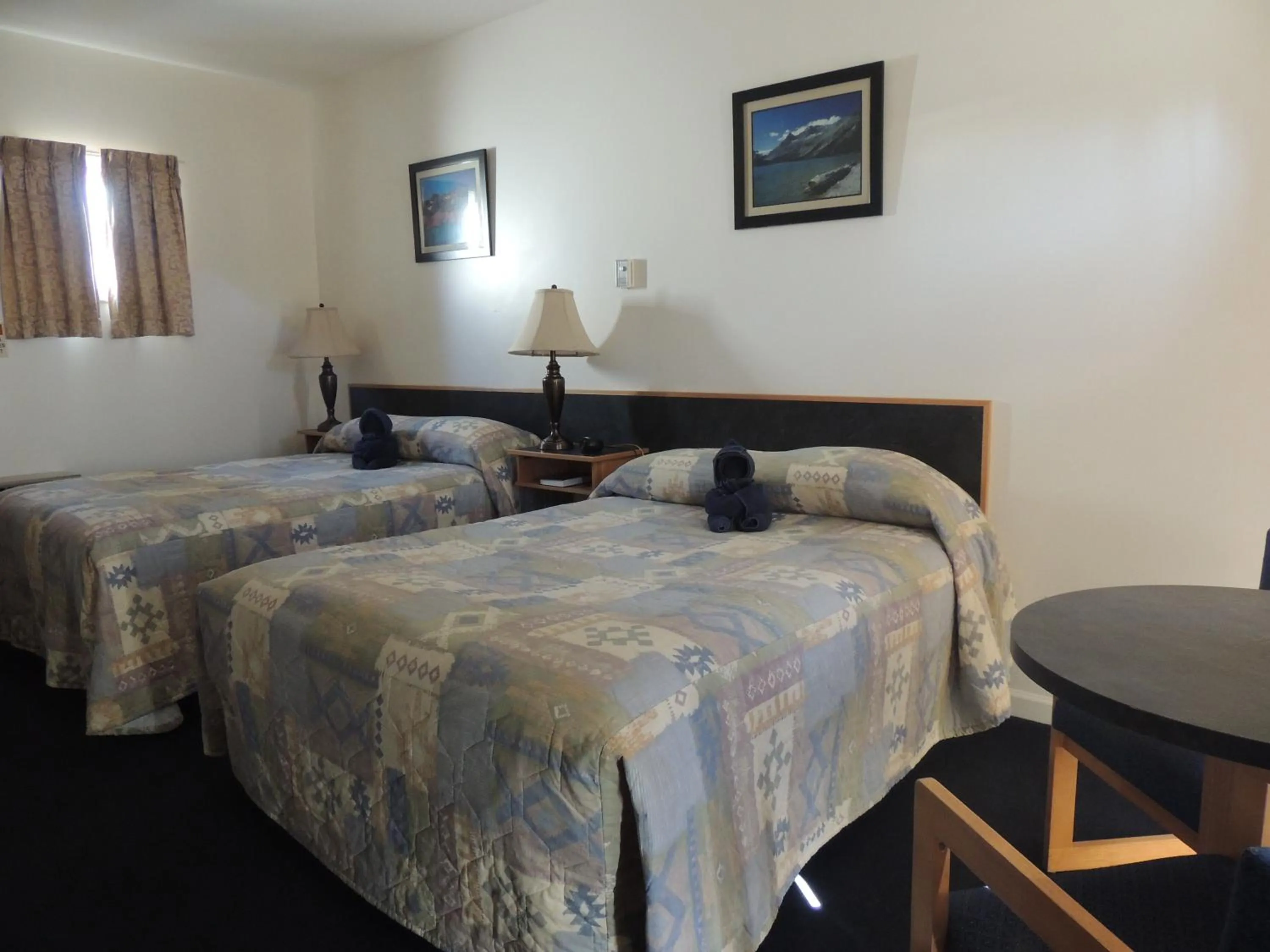 Photo of the whole room, Bed in 100 Mile Motel & RV Park