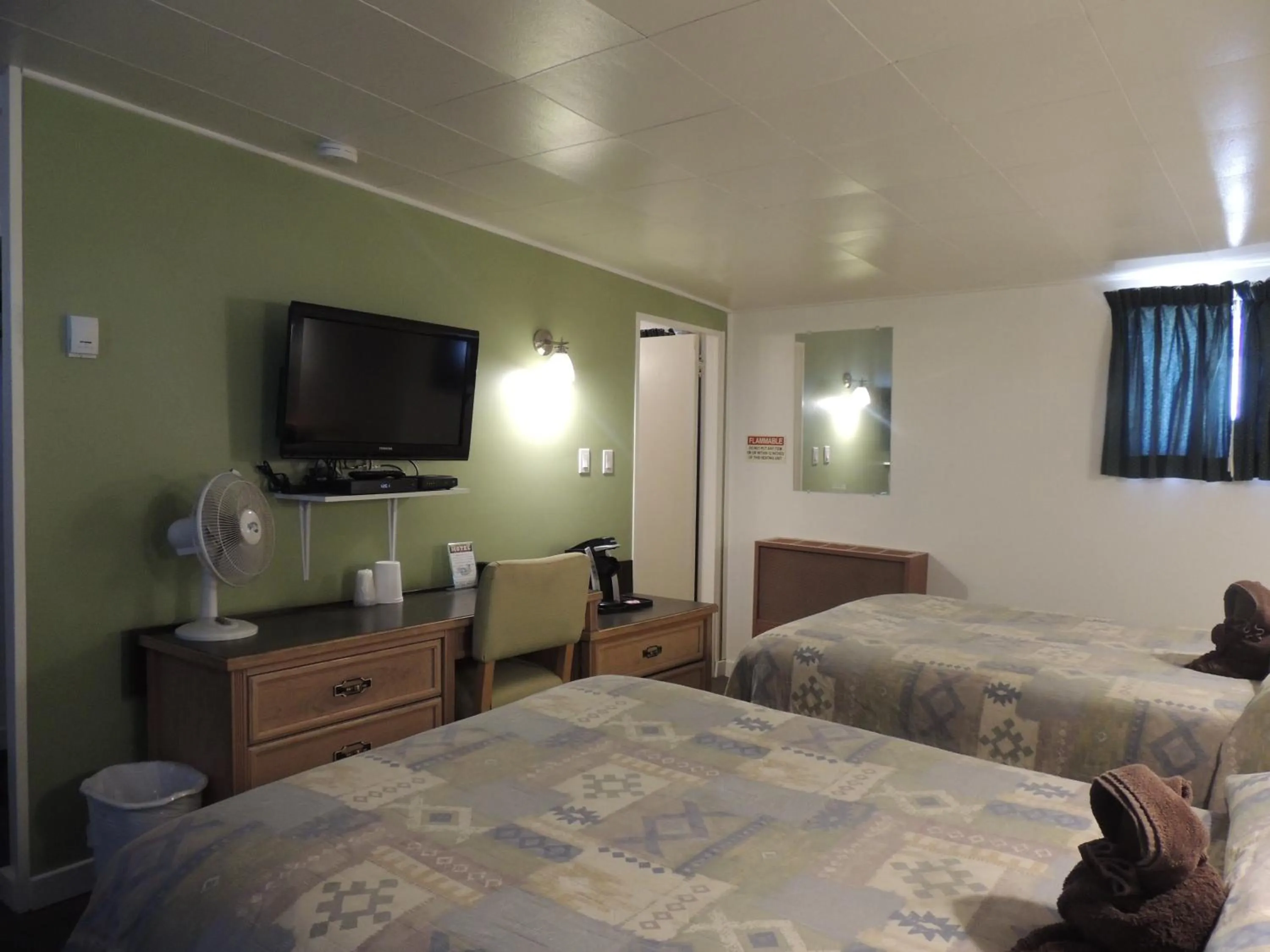 Photo of the whole room, Bed in 100 Mile Motel & RV Park