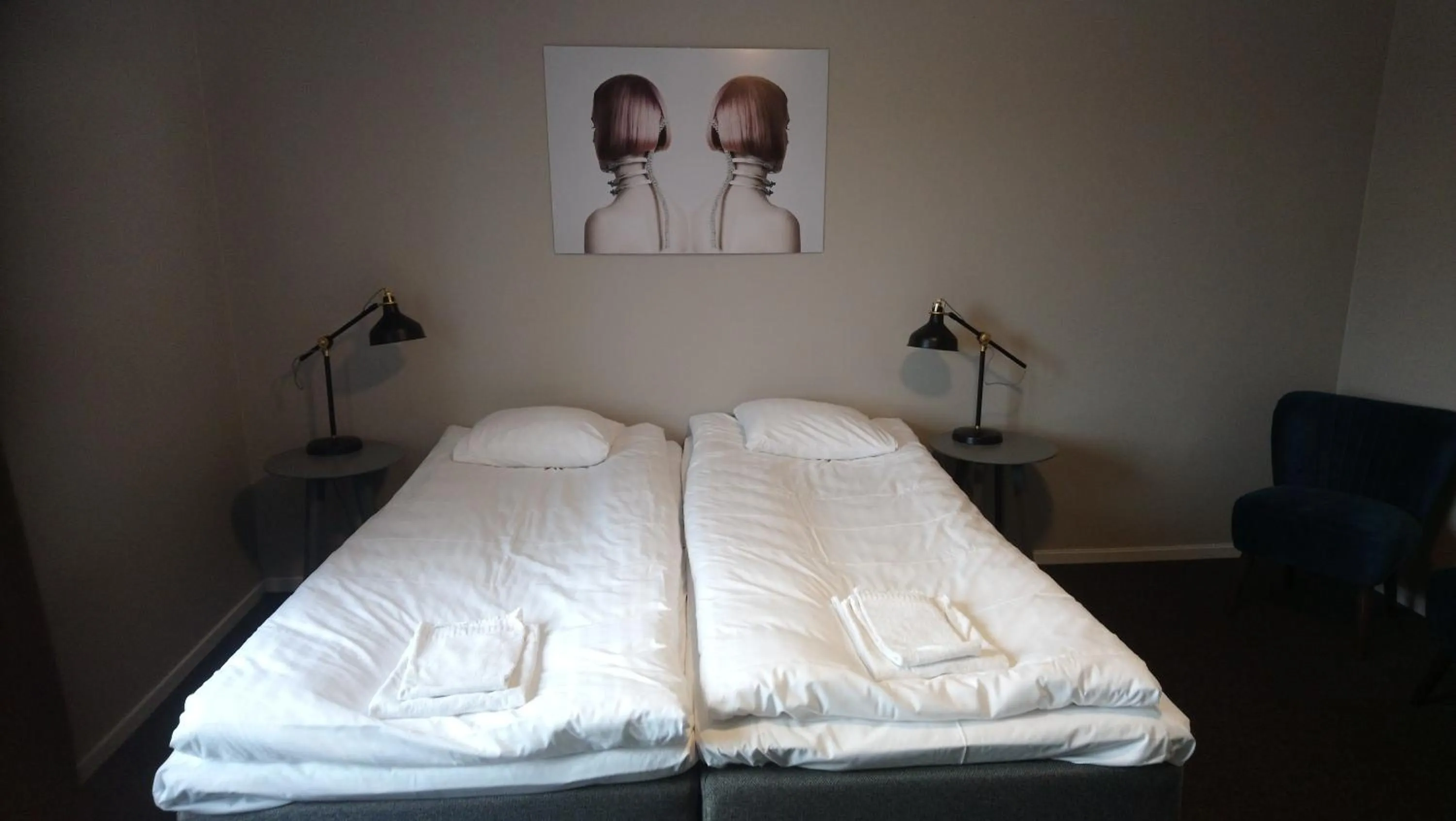 Photo of the whole room, Bed in BriQ Hotell