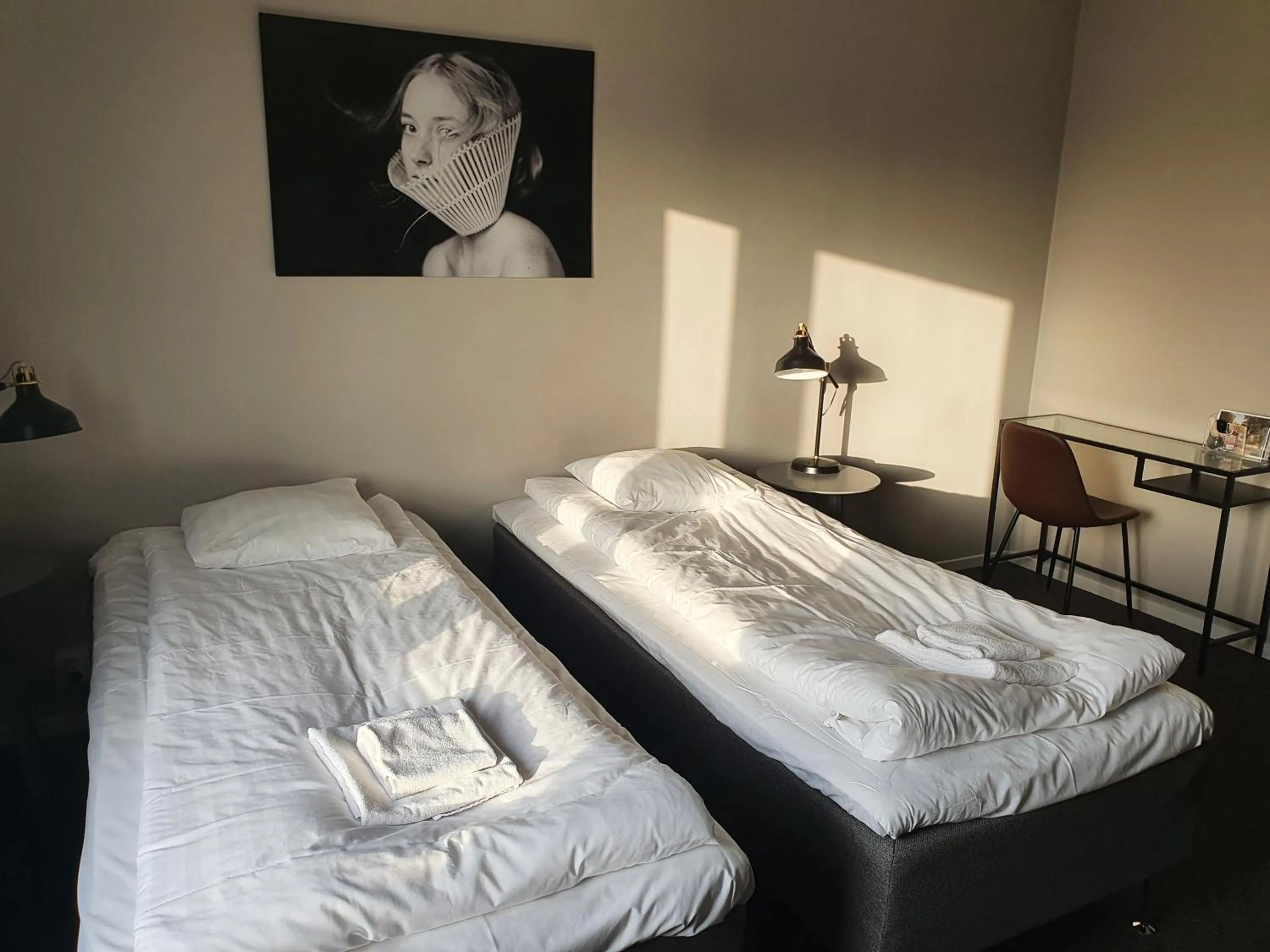 Photo of the whole room, Bed in BriQ Hotell