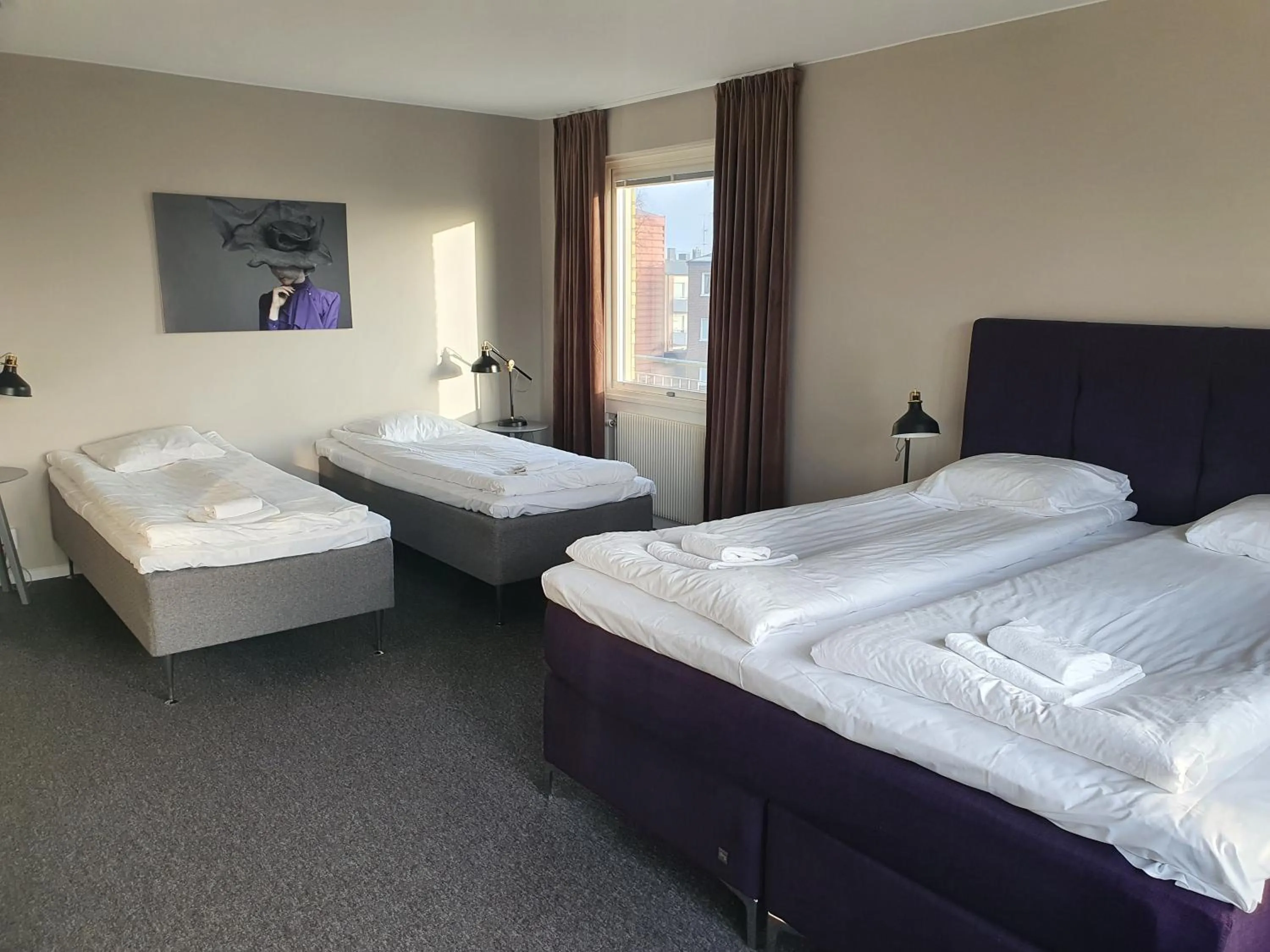 Photo of the whole room, Bed in BriQ Hotell