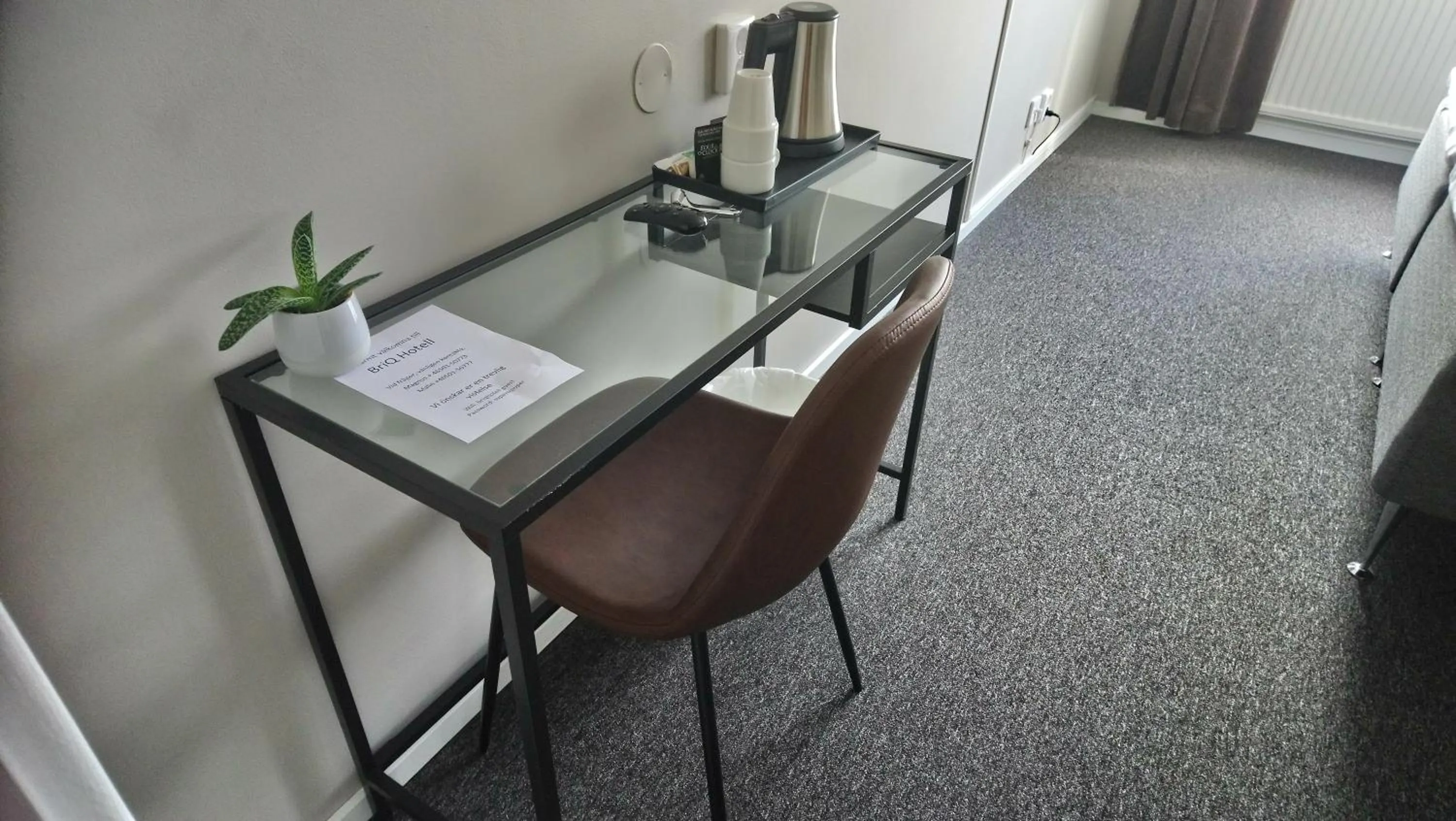 Photo of the whole room in BriQ Hotell