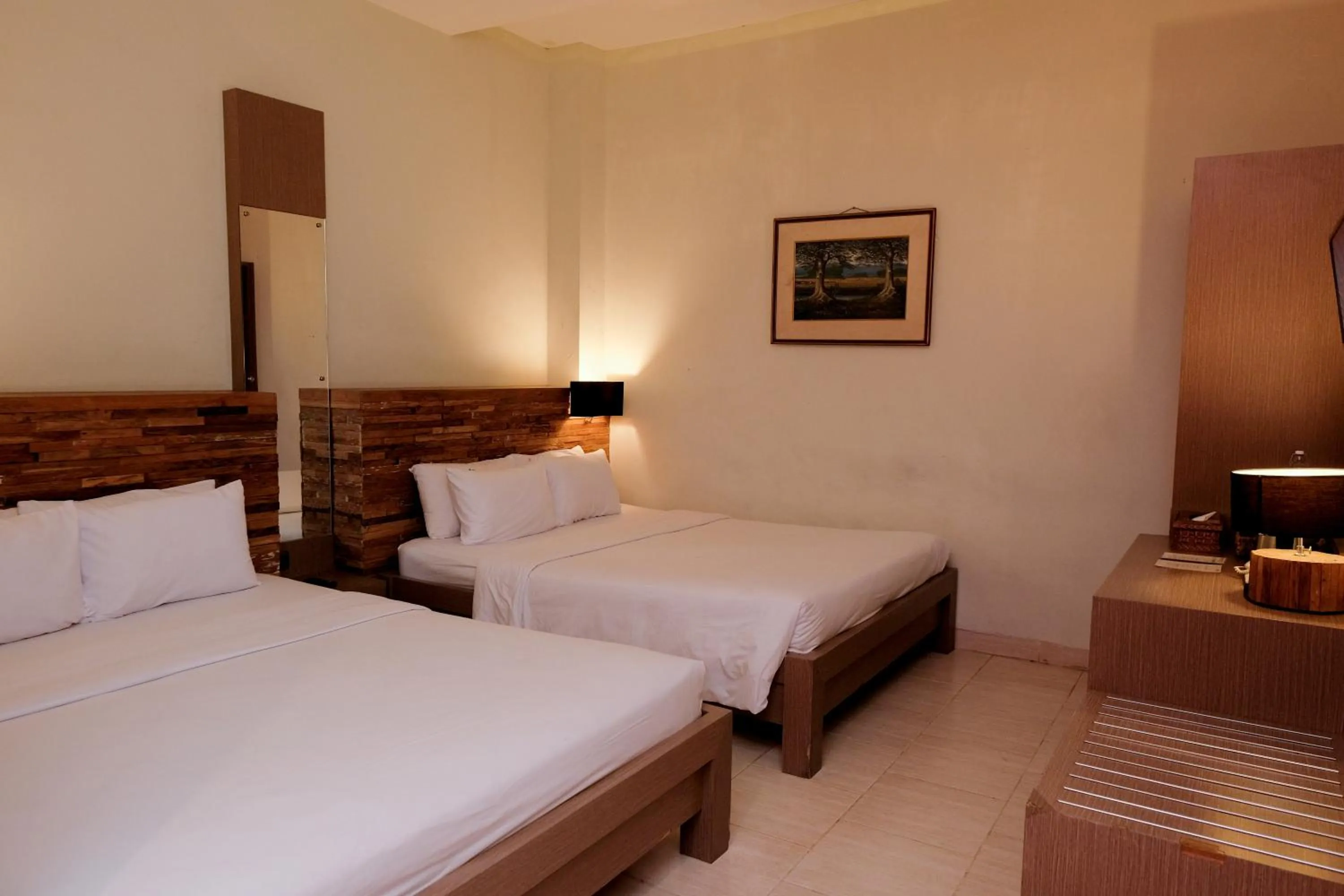 Bed in Mawar Asri Hotel