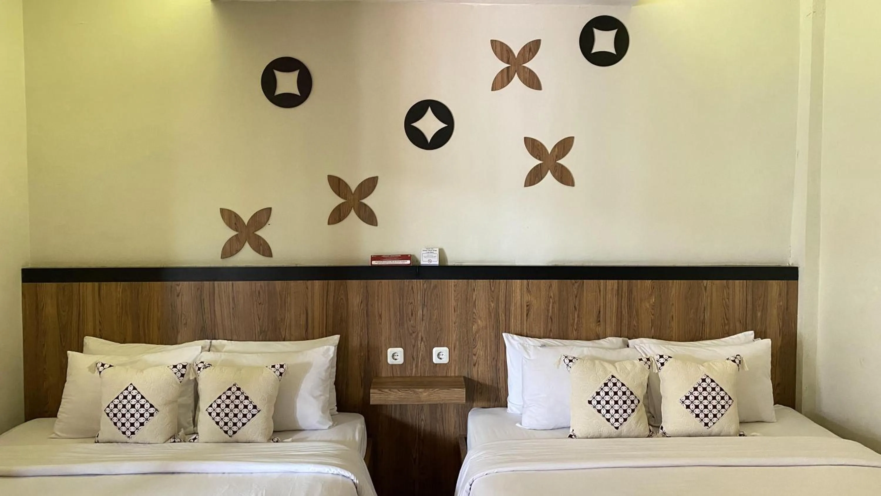 Bed in Mawar Asri Hotel