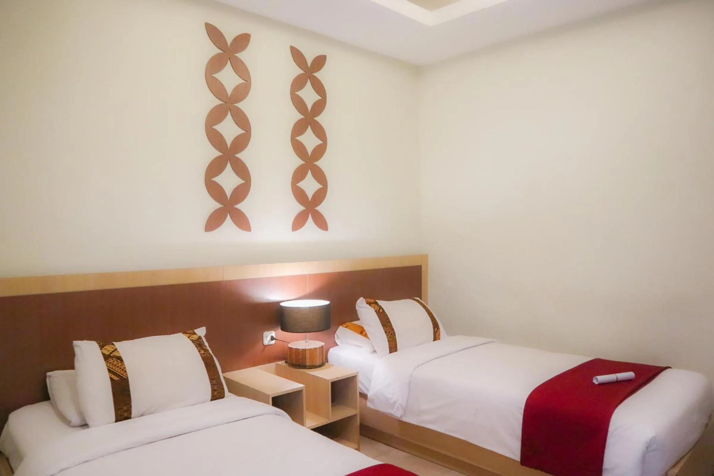 Bed in Mawar Asri Hotel