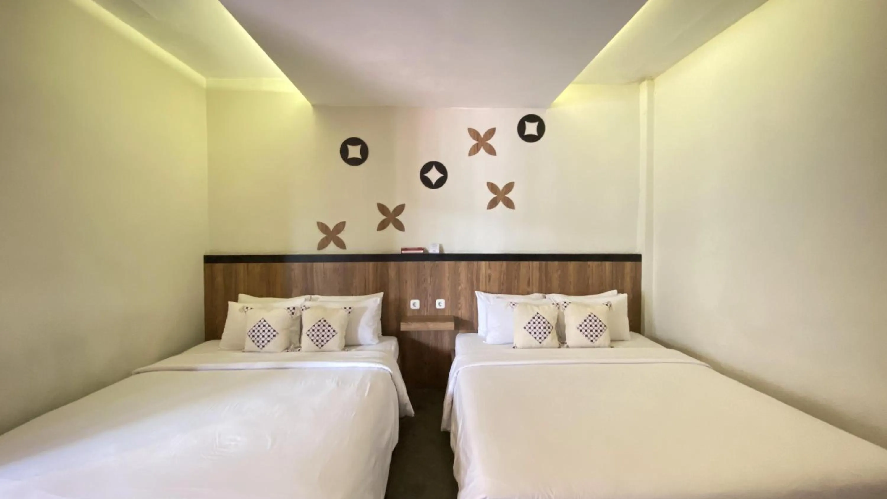 Bed in Mawar Asri Hotel