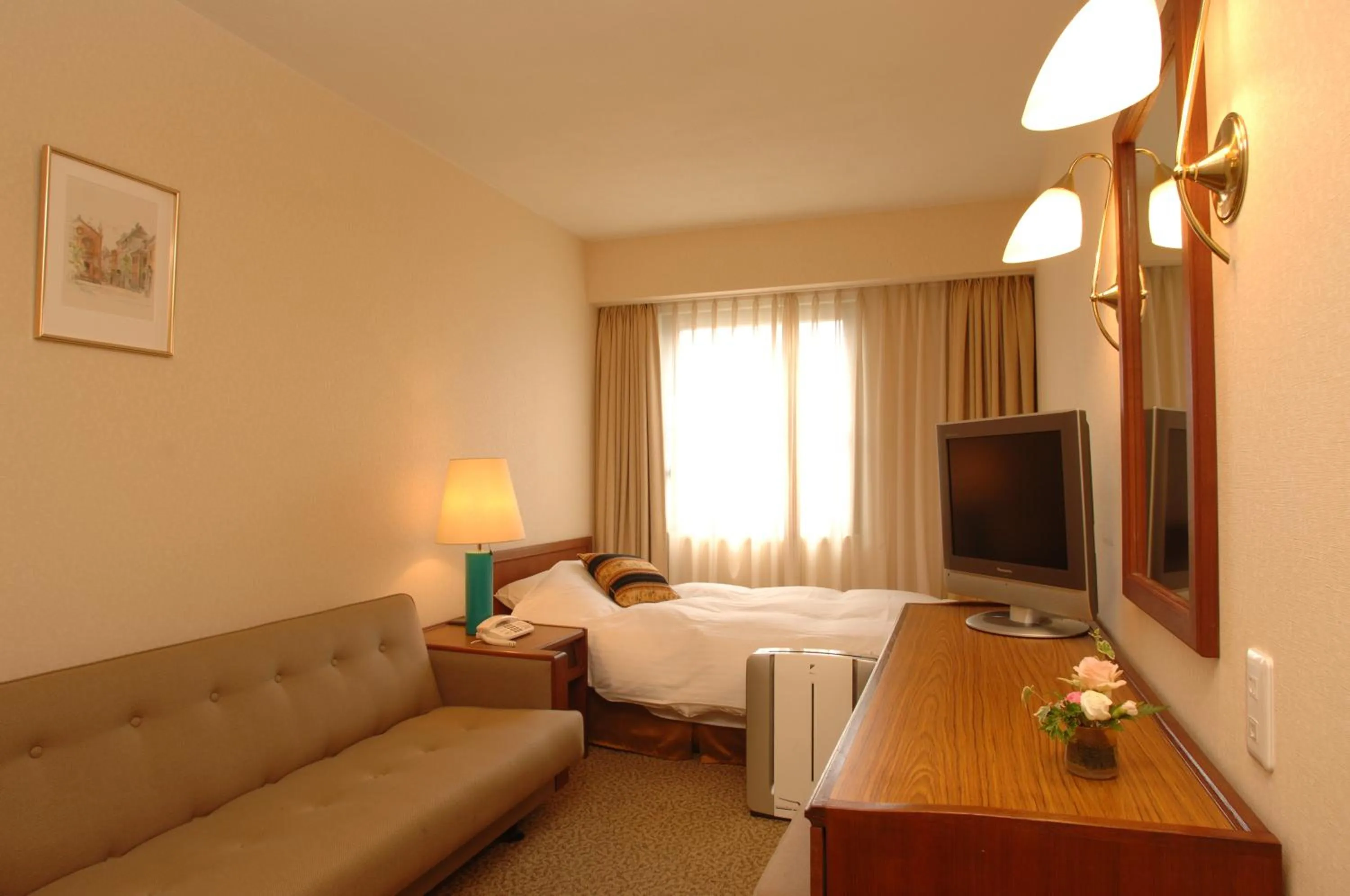 Bed in Grand Plaza Nakatsu Hotel