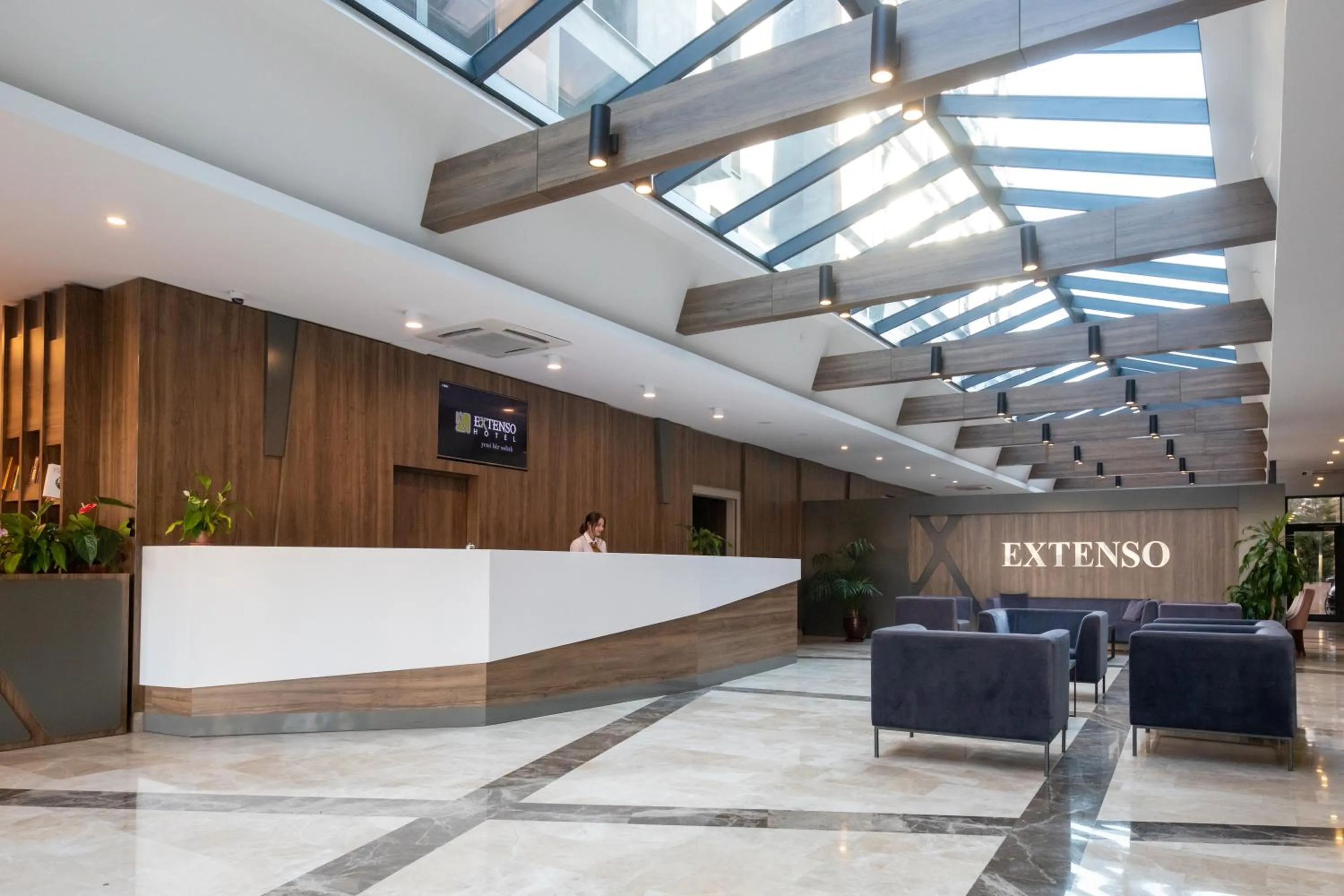 Lobby or reception in Extenso Hotel