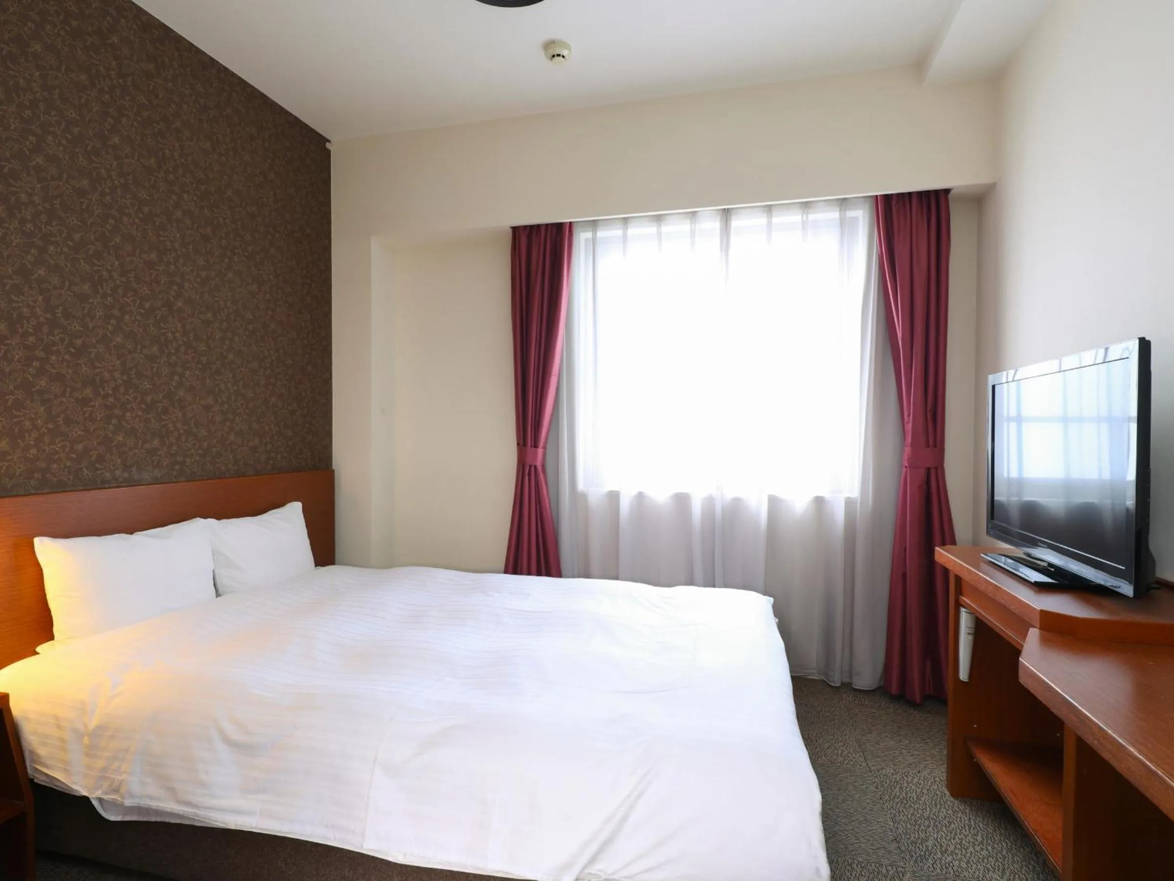 Bed in Dormy Inn Premium Wakayama Natural Hot Spring