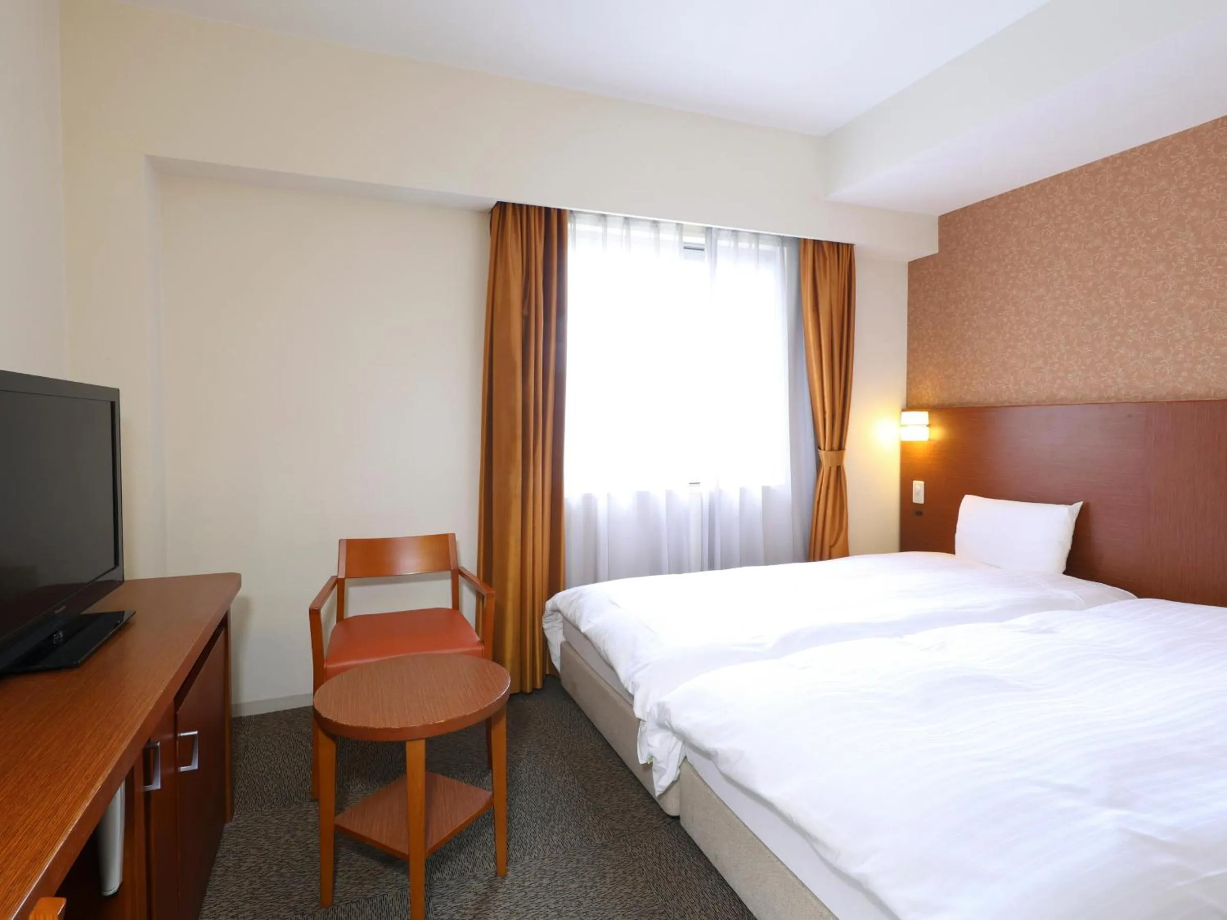 Bed in Dormy Inn Premium Wakayama Natural Hot Spring