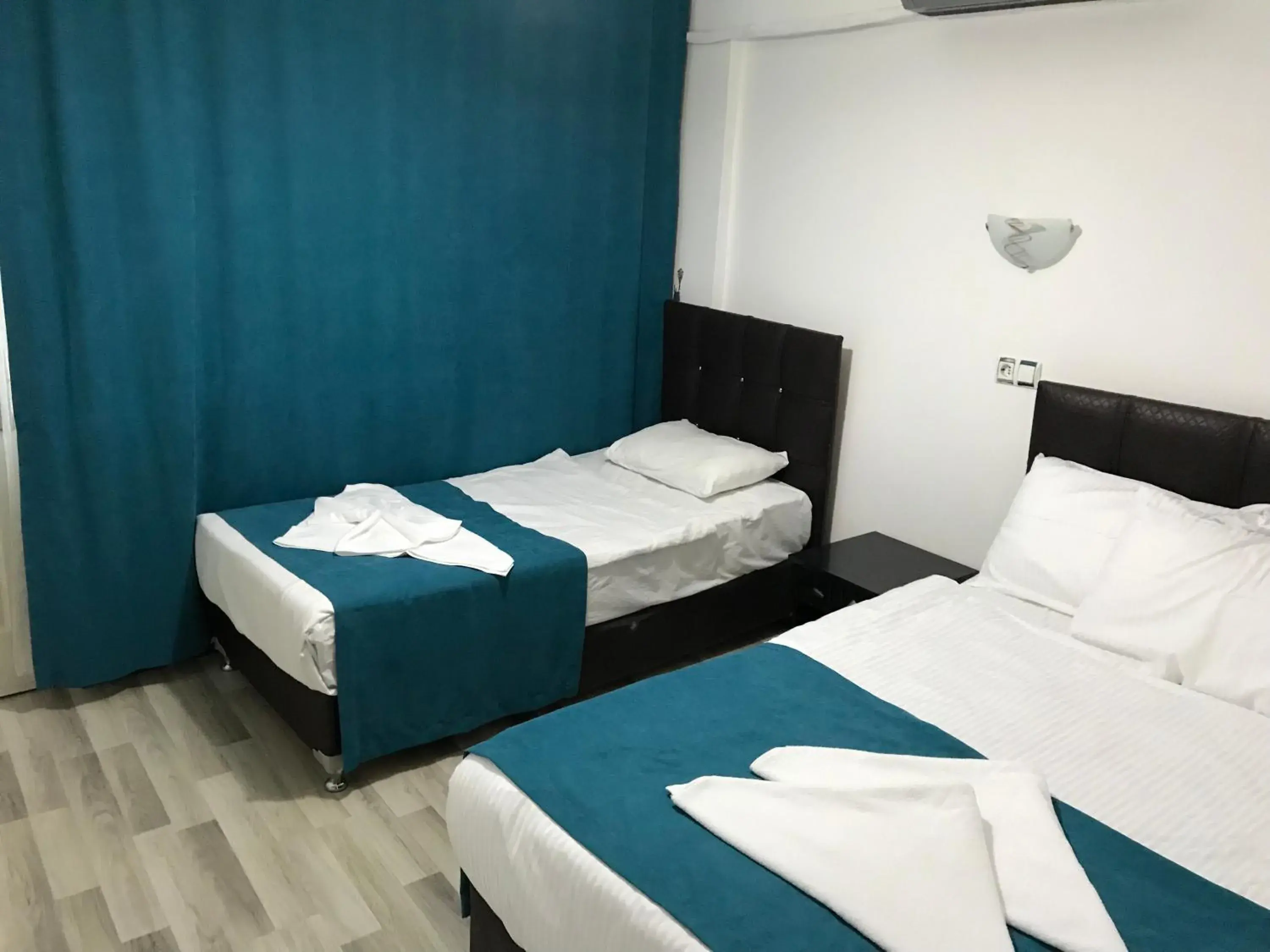 Standard Triple Room in Sunrise Aya Hotel Standard Triple Room in Sunrise Aya Hotel