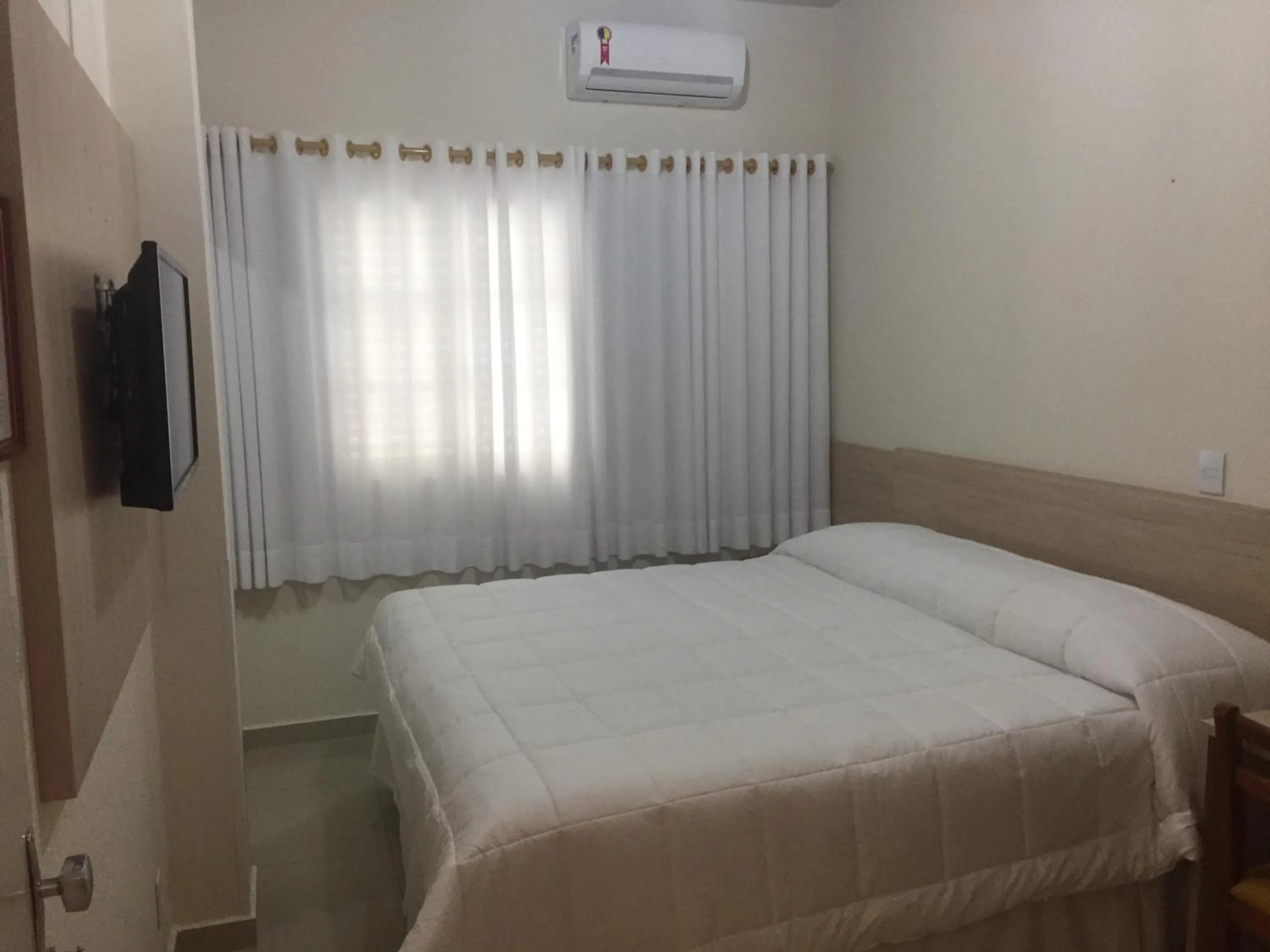 Bed in Santa Rosa Hotel