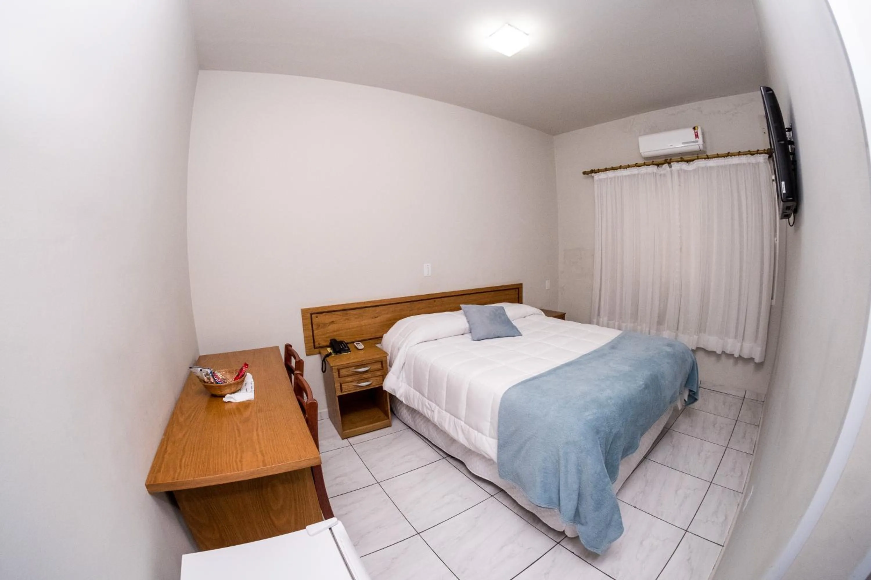 Bed in Santa Rosa Hotel