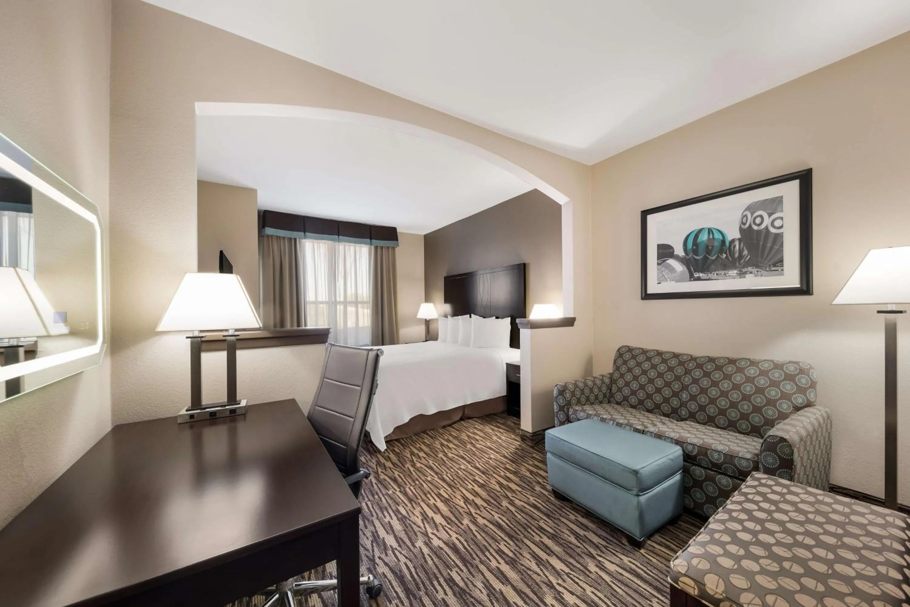 Seating area, Bed in SureStay Plus Hotel by Best Western Plano