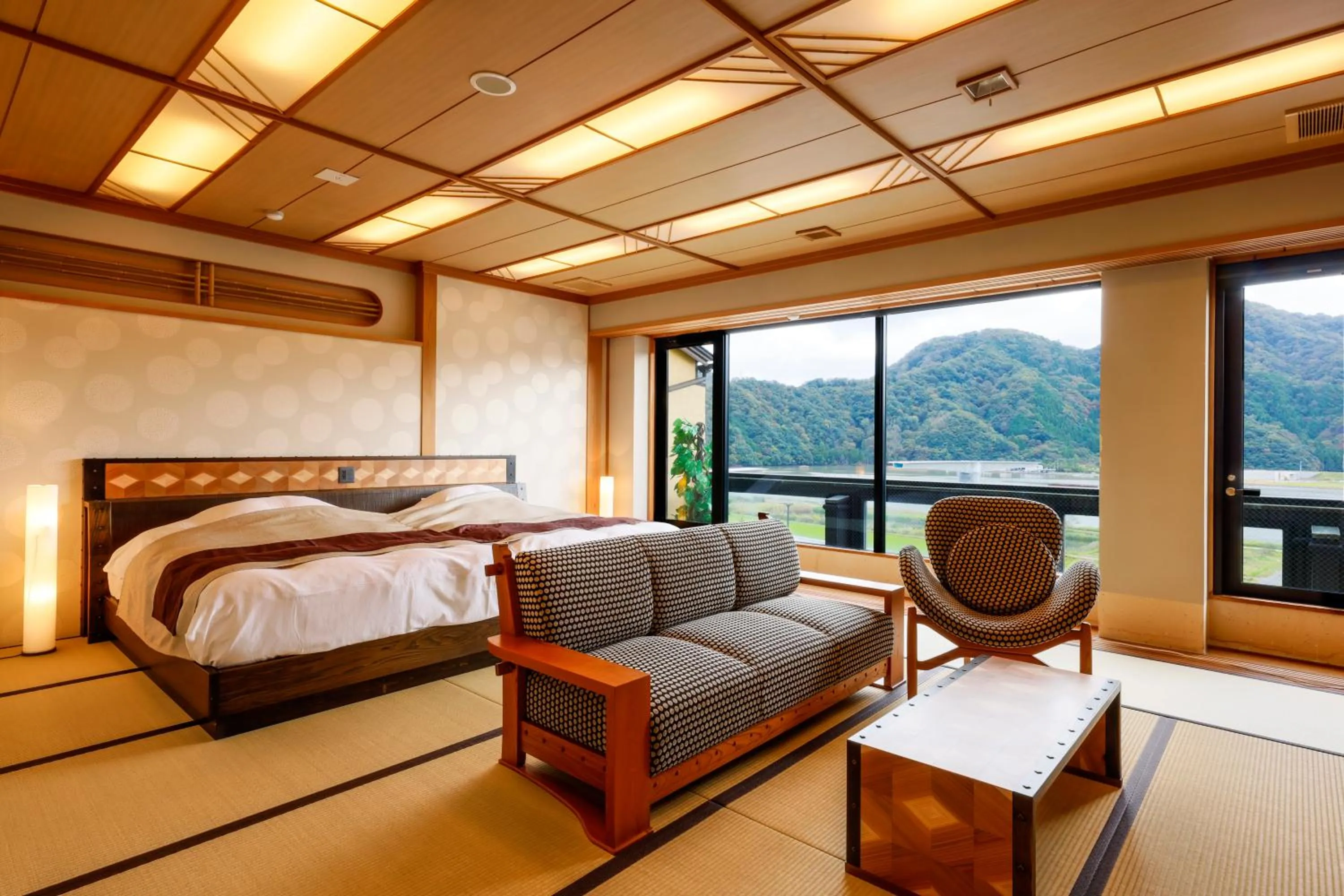 Bed in Kawaguchiya Kinosaki Riverside Hotel