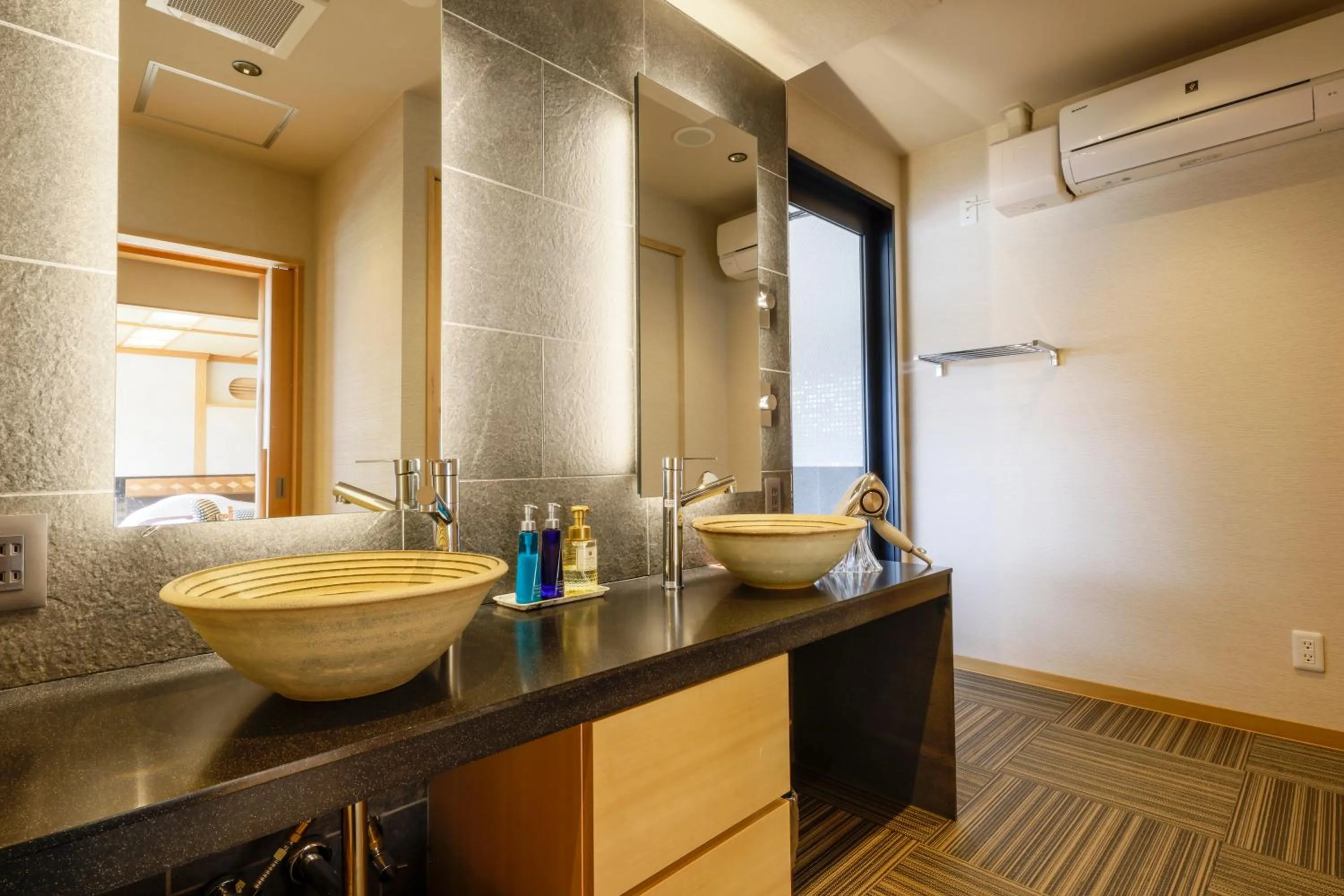 Bathroom in Kawaguchiya Kinosaki Riverside Hotel