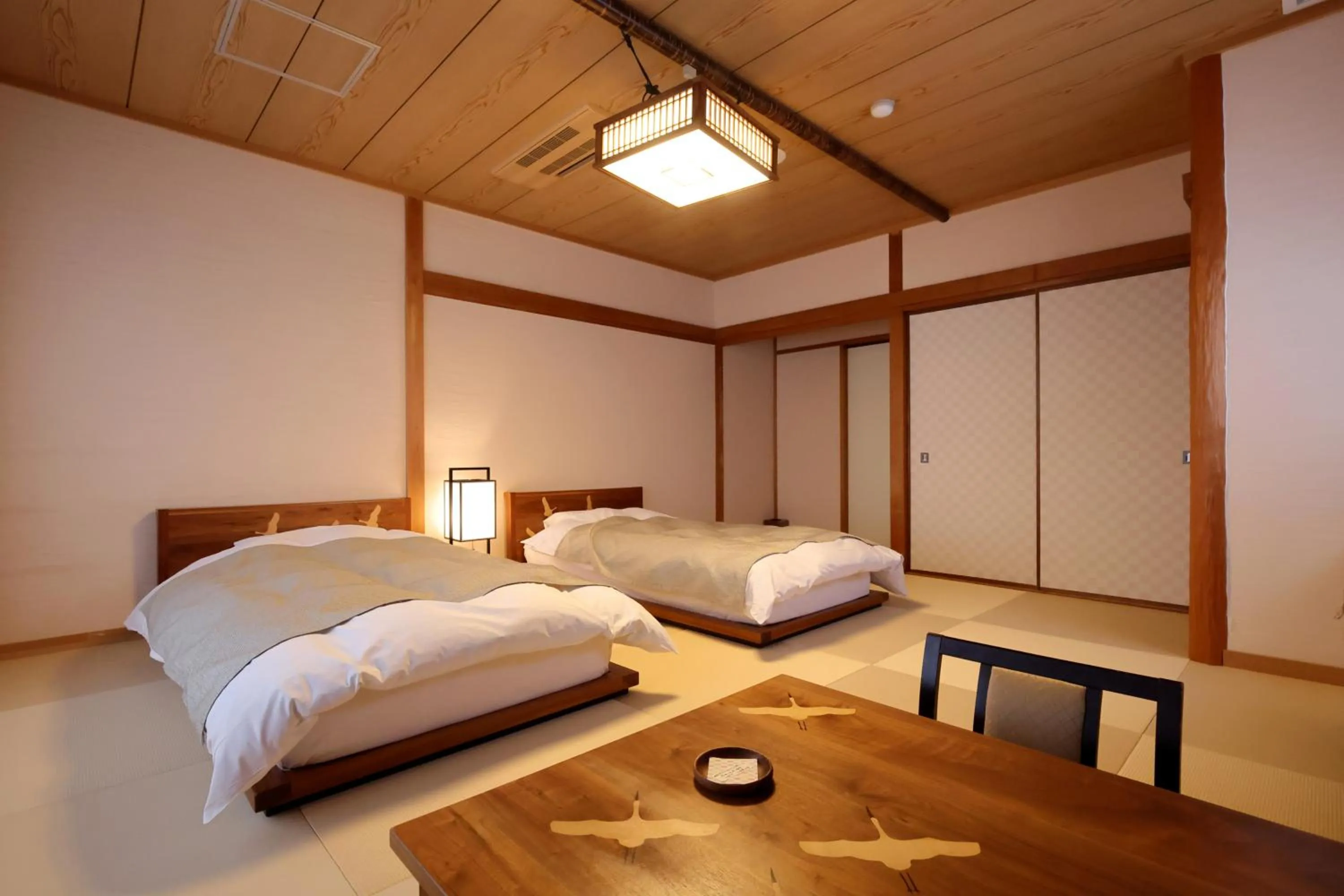 Bedroom, Bed in Kawaguchiya Kinosaki Riverside Hotel