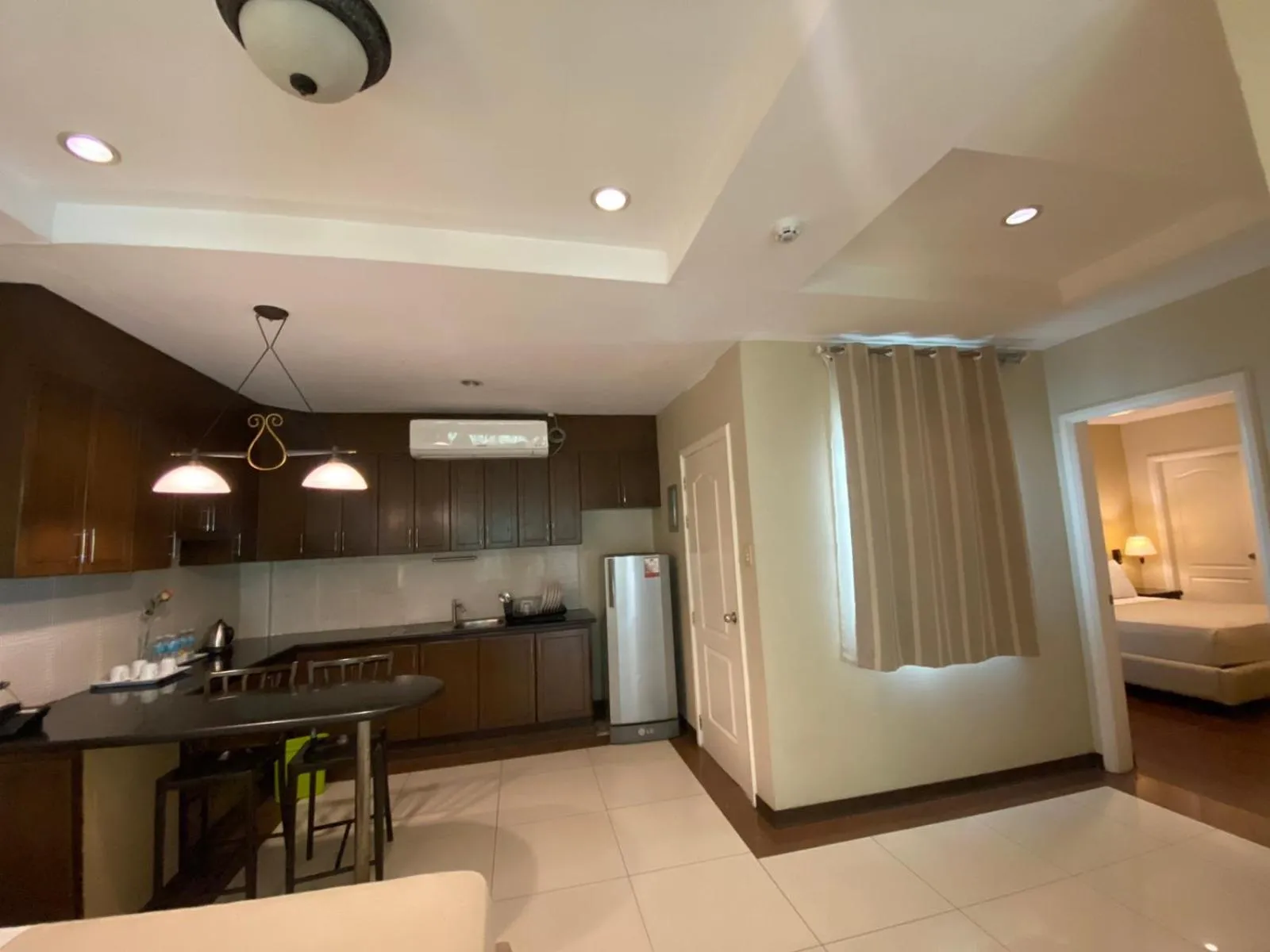 Kitchen or kitchenette in Prism Hotel